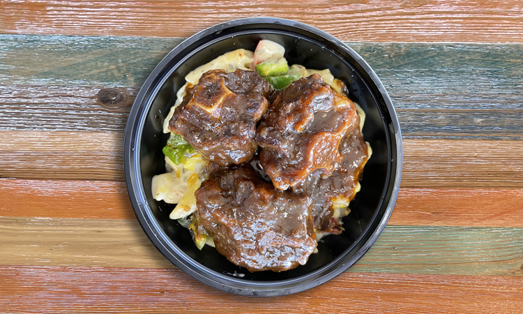 Order Rasta Pasta w/ Oxtail food online from Irie Jamaican Kitchen store, Cleveland on bringmethat.com