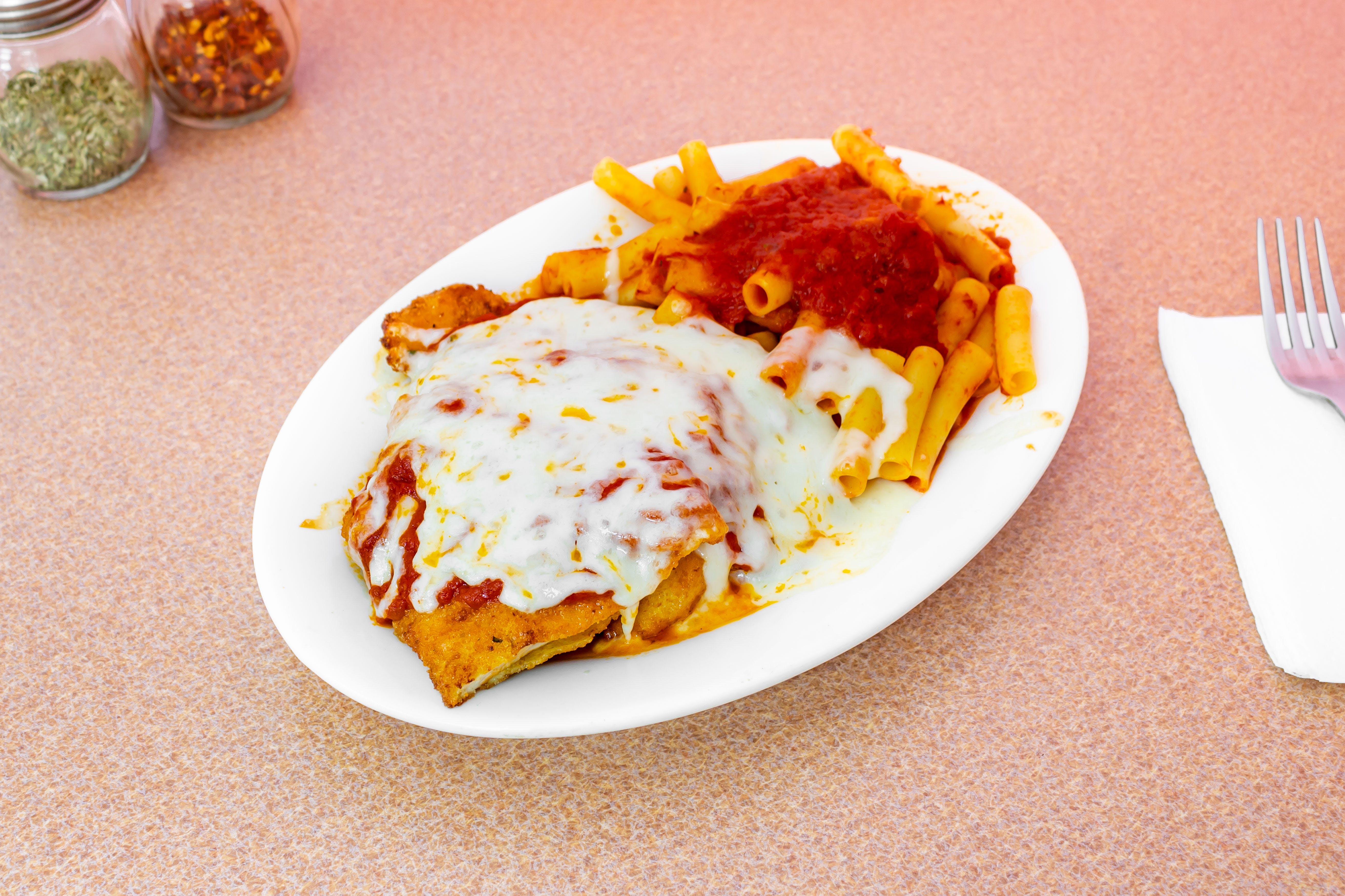 Order Chicken Parmigiana - Entree food online from I Love NY Pizza store, Yonkers on bringmethat.com
