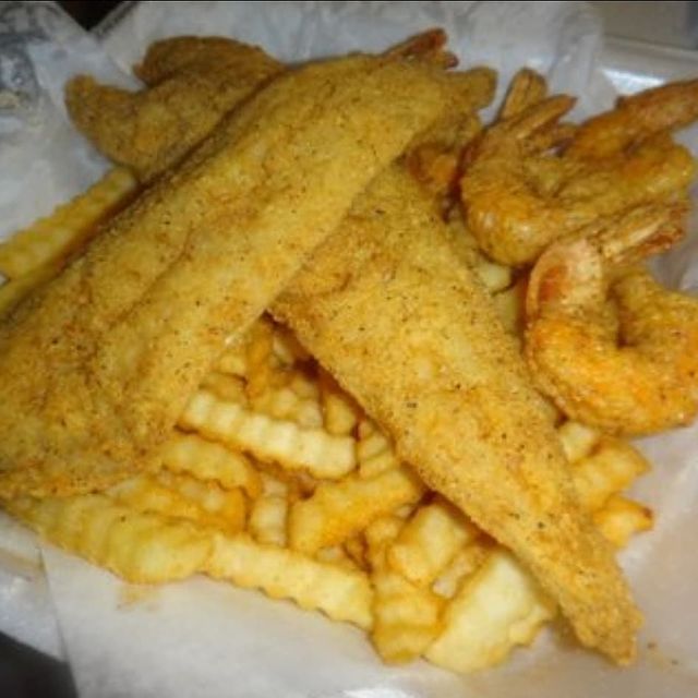 Order Tilapia and Fries food online from The Wing Spot store, Stone Mountain on bringmethat.com
