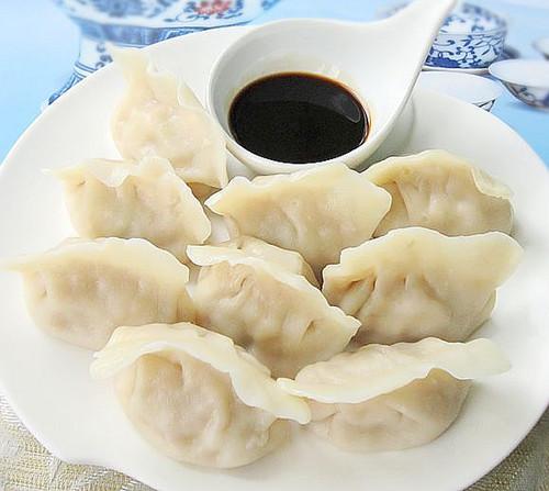 Order 9. Steamed Chinese Pork and Dumpling (8) food online from Moon Buffet store, Eleanor on bringmethat.com