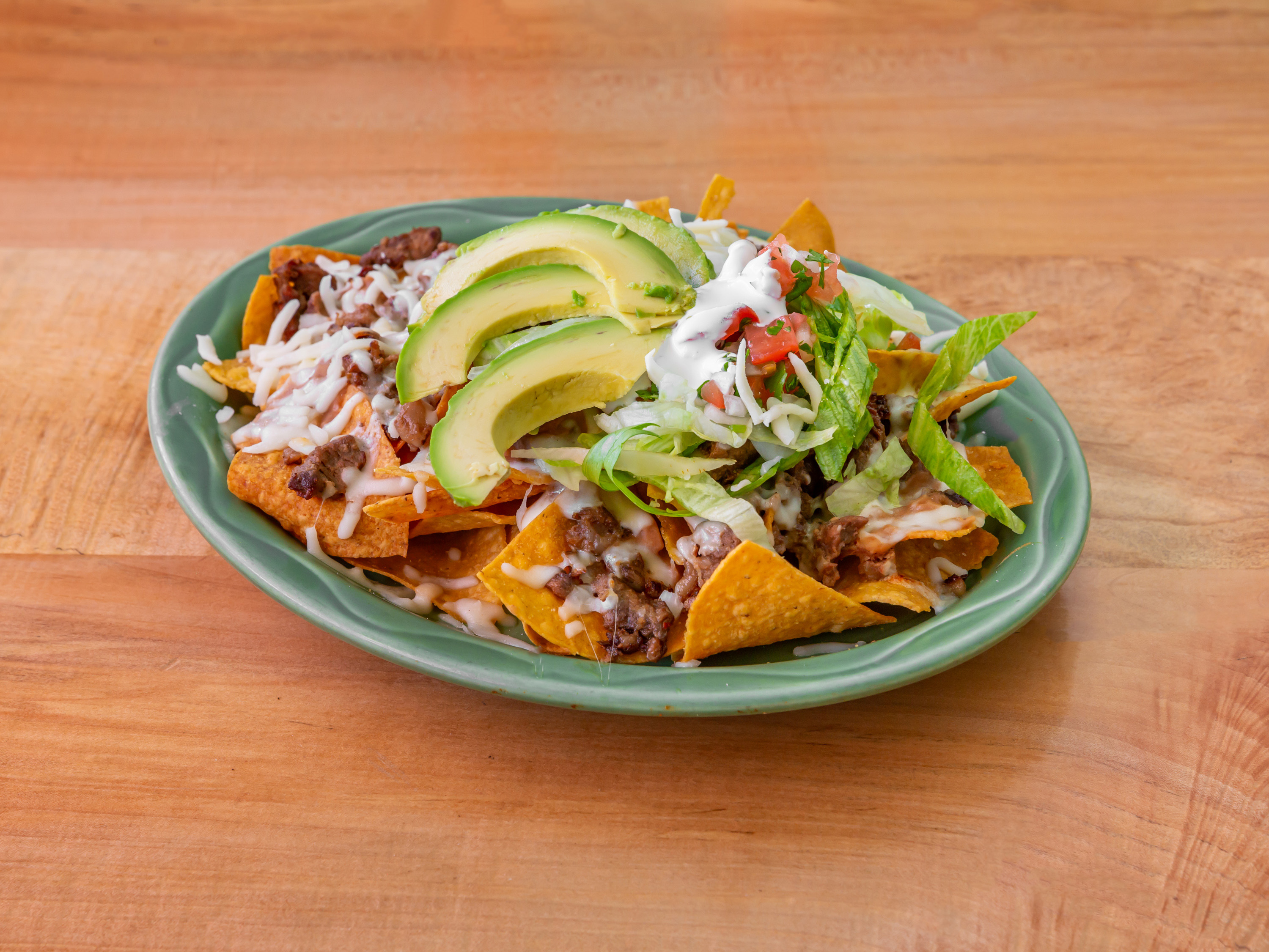 Order Nachos food online from El Tikal store, Lynn on bringmethat.com