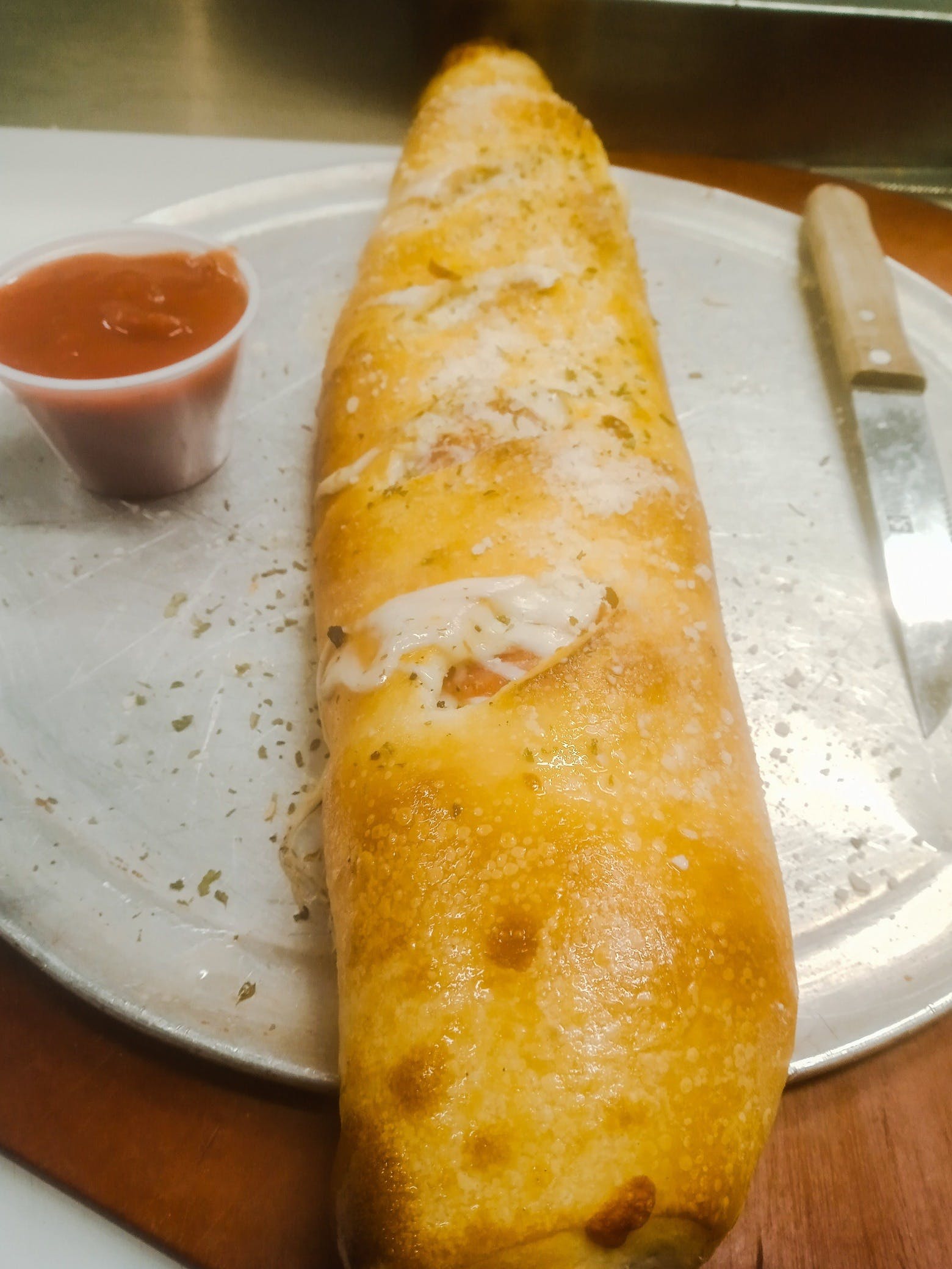Order Build Your Own Stromboli - Stromboli food online from Cheap Seats Tavern 2 store, Bluffton on bringmethat.com