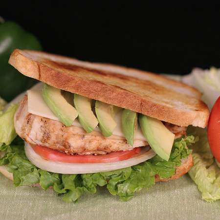 Order Cajun Chicken with Avocado Sandwich food online from Dejavu Cafe store, Isla Vista on bringmethat.com