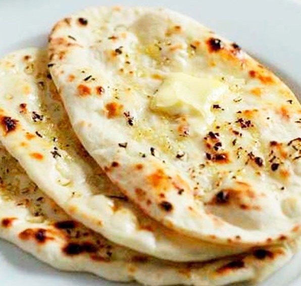 Order Butter Naan food online from India Oven store, Roseville on bringmethat.com