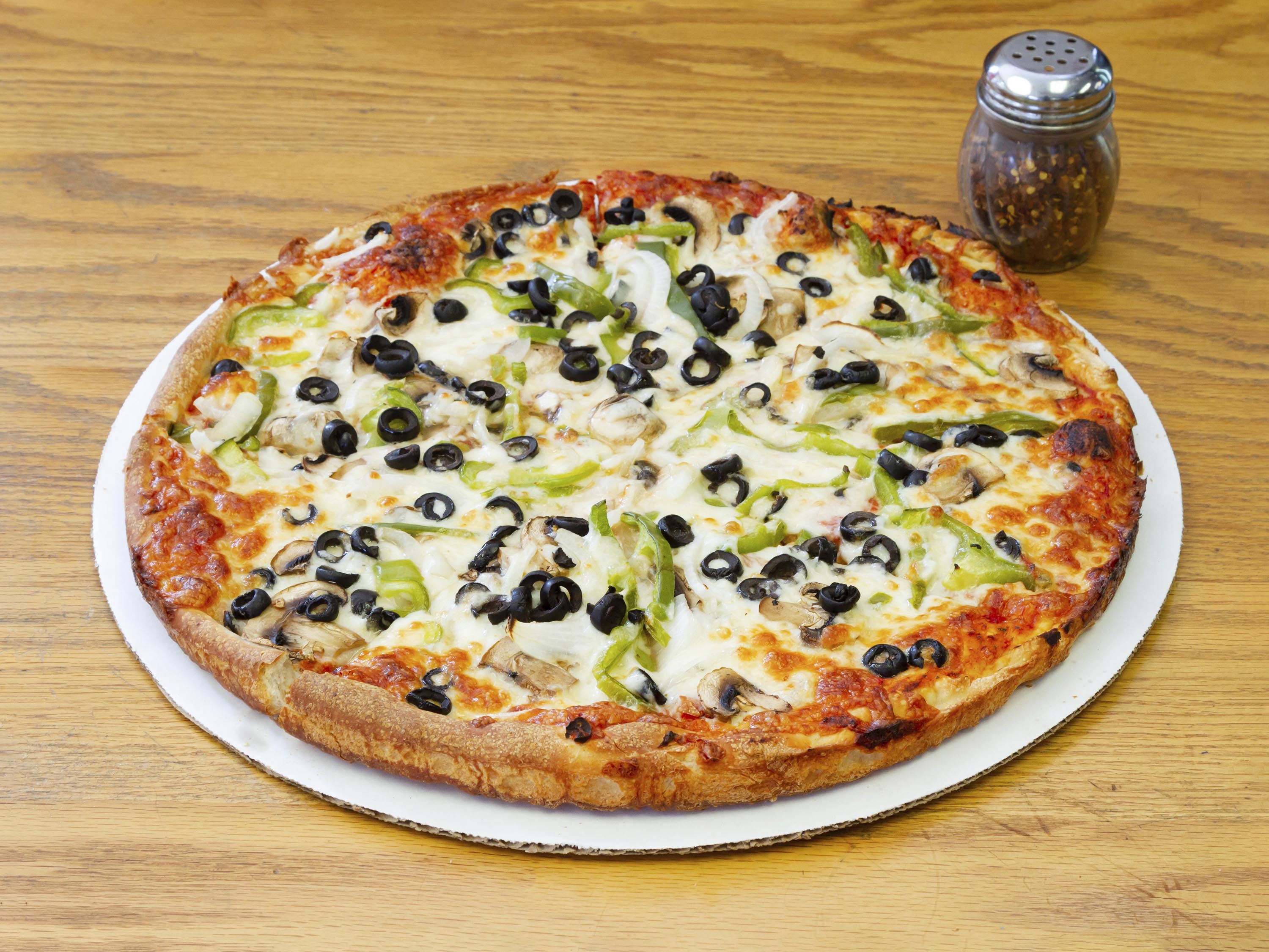 Order Veggie Special Pizza food online from Romanzza Pizzeria & More store, Quincy on bringmethat.com