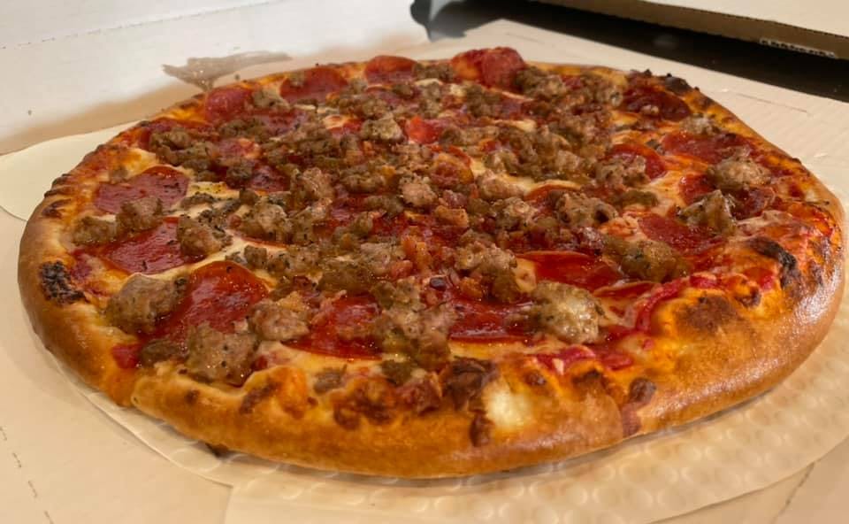 Order The Ulti-Meat Pizza - Small 12" (Serves 2 People) food online from Pagoni's Pizza store, Kaukauna on bringmethat.com