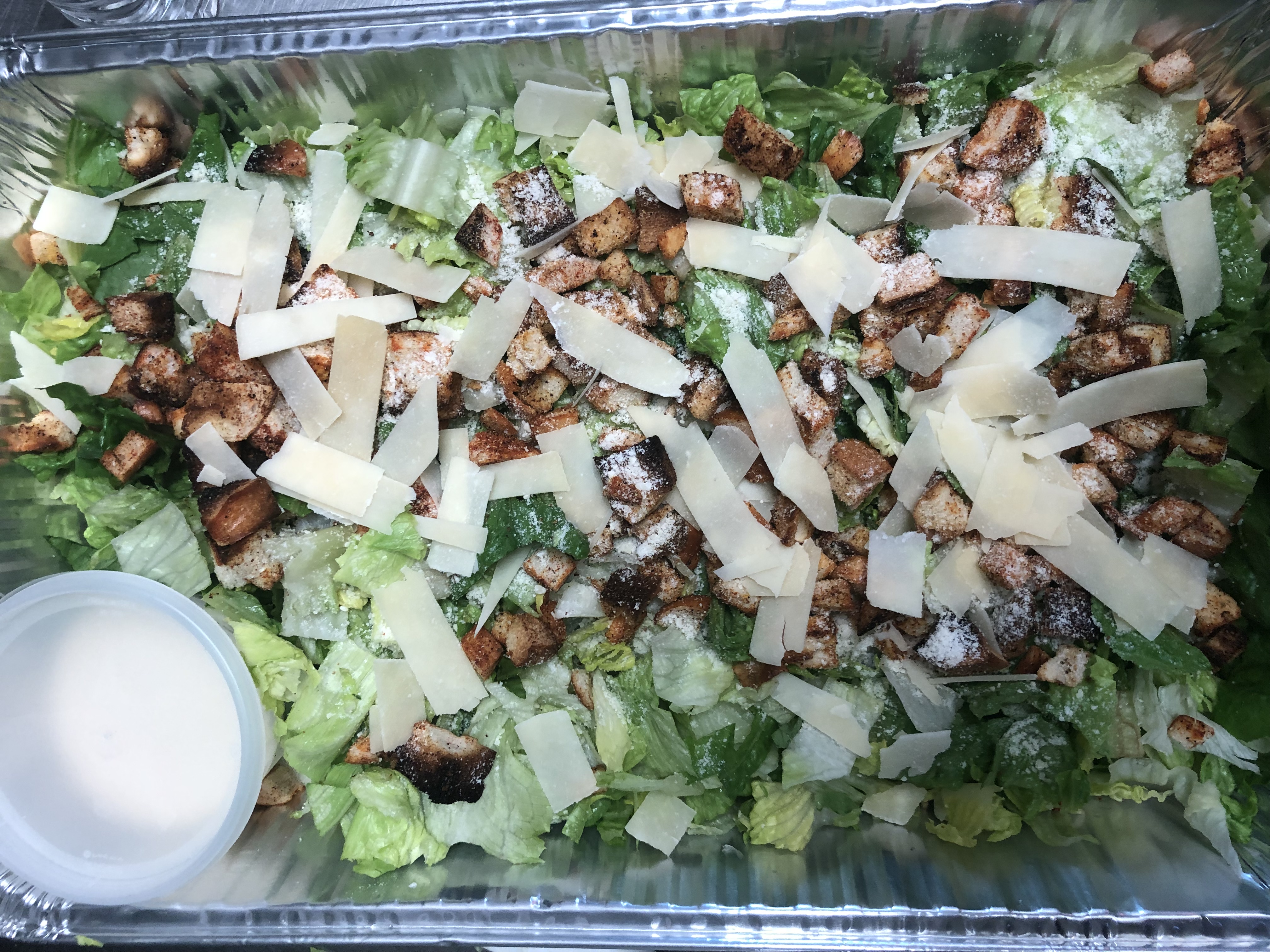 Order Caesar Salad Tray food online from Tonitos Pizza store, West Chester on bringmethat.com