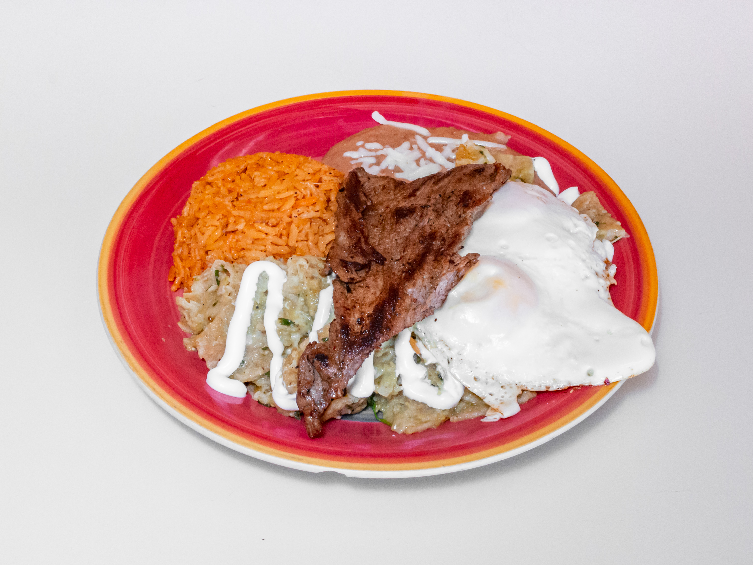 Order Chilaquiles with Egg and Meat Breakfast food online from Los Azares Mexican Grill store, Chicago on bringmethat.com