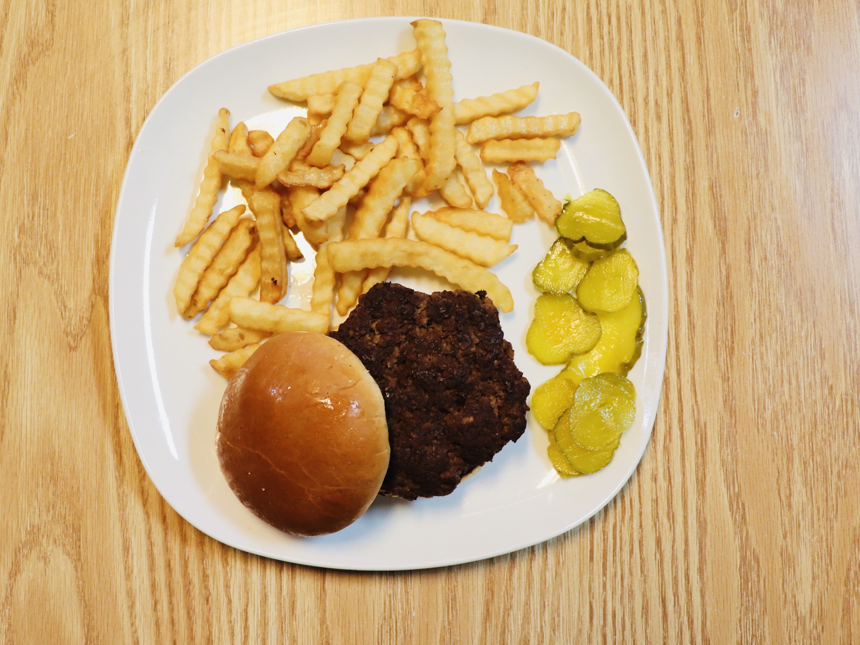 Order 1/4 lb. Burger Lunch food online from Charlie Cafe store, Norfolk on bringmethat.com