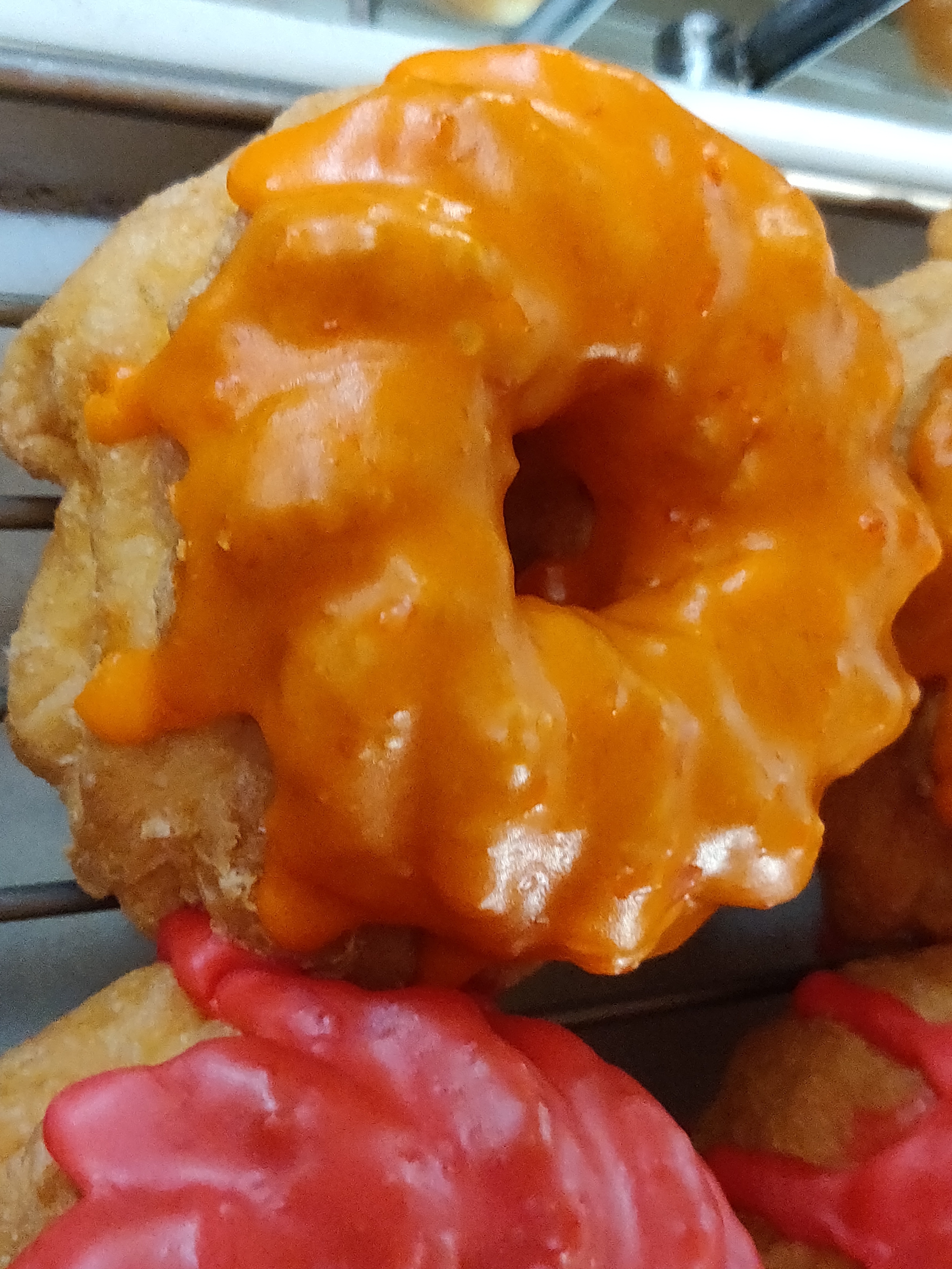 Order Orange Icing French Cruller food online from Donut Club store, San Dimas on bringmethat.com