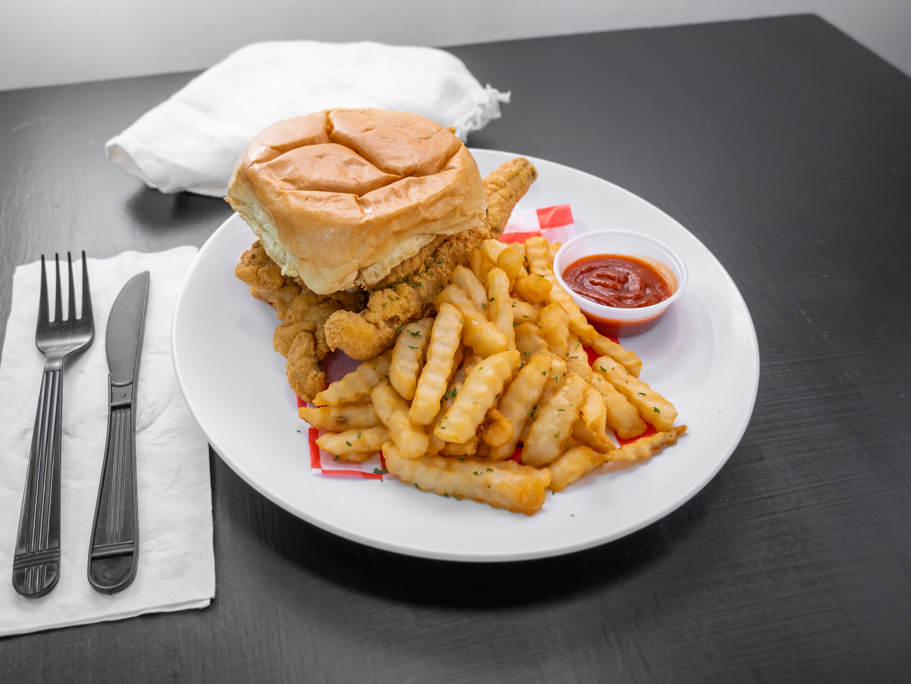 Order Whiting Fish Sandwich food online from Friends Café store, Camden on bringmethat.com