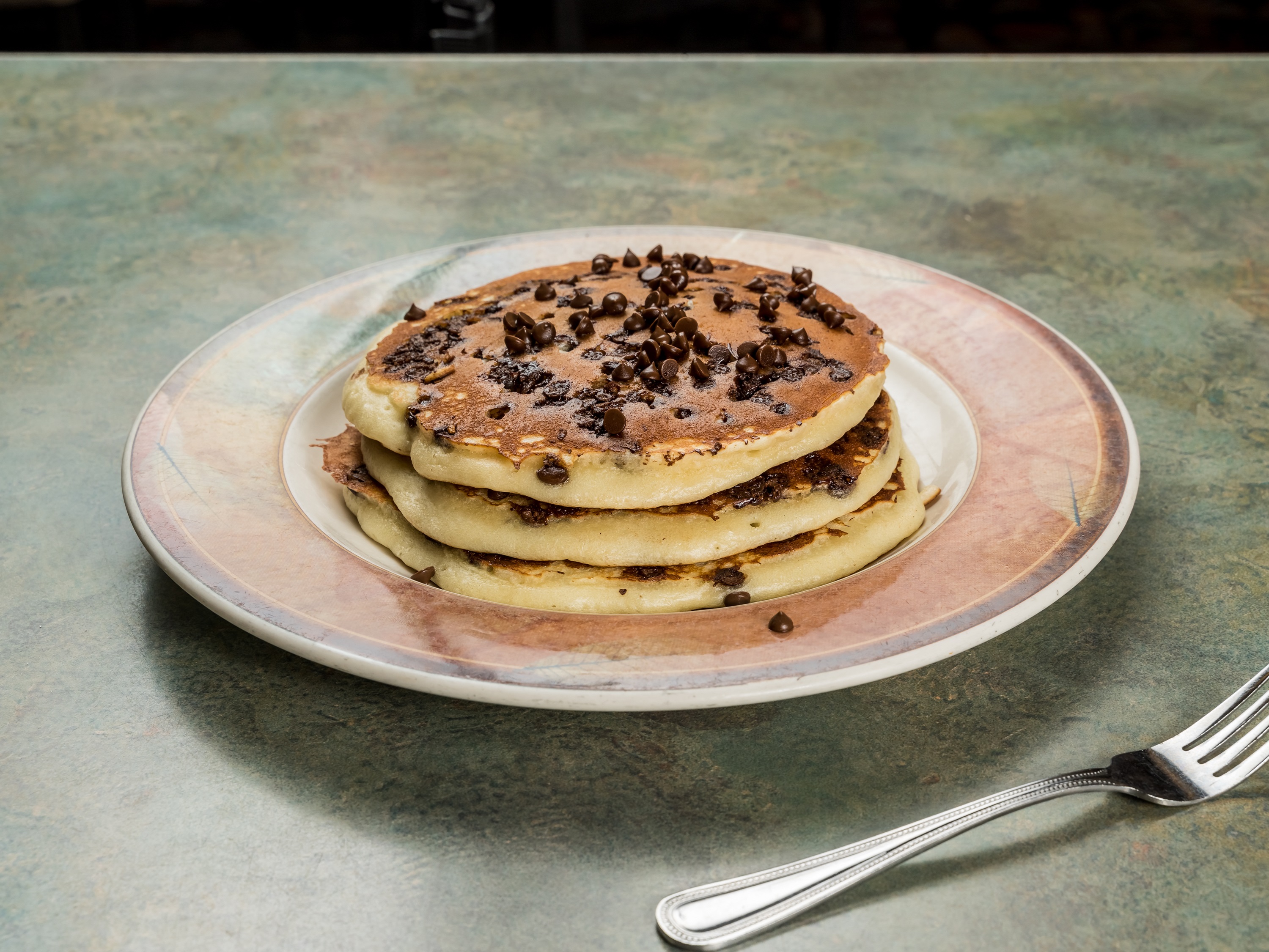 Order Chocolate Chip Pancakes food online from Hauppauge Palace Diner store, Hauppauge on bringmethat.com