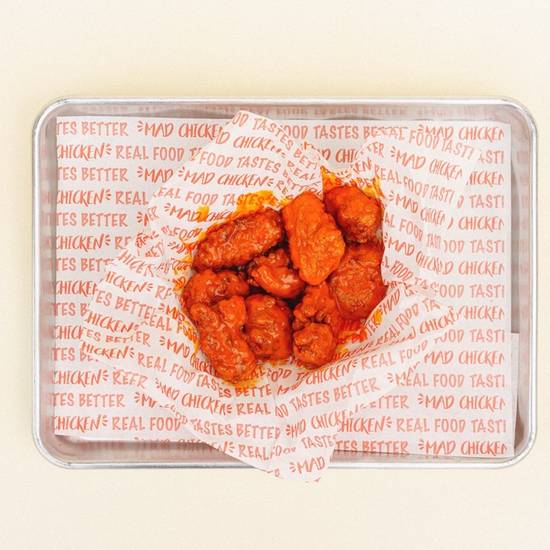Order .8 BONELESS WINGS * food online from Mad Chicken store, Milwaukee on bringmethat.com