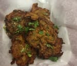 Order 7. Onion Bhajiya  food online from New Taj Mahal Indian Restaurant store, Columbus on bringmethat.com