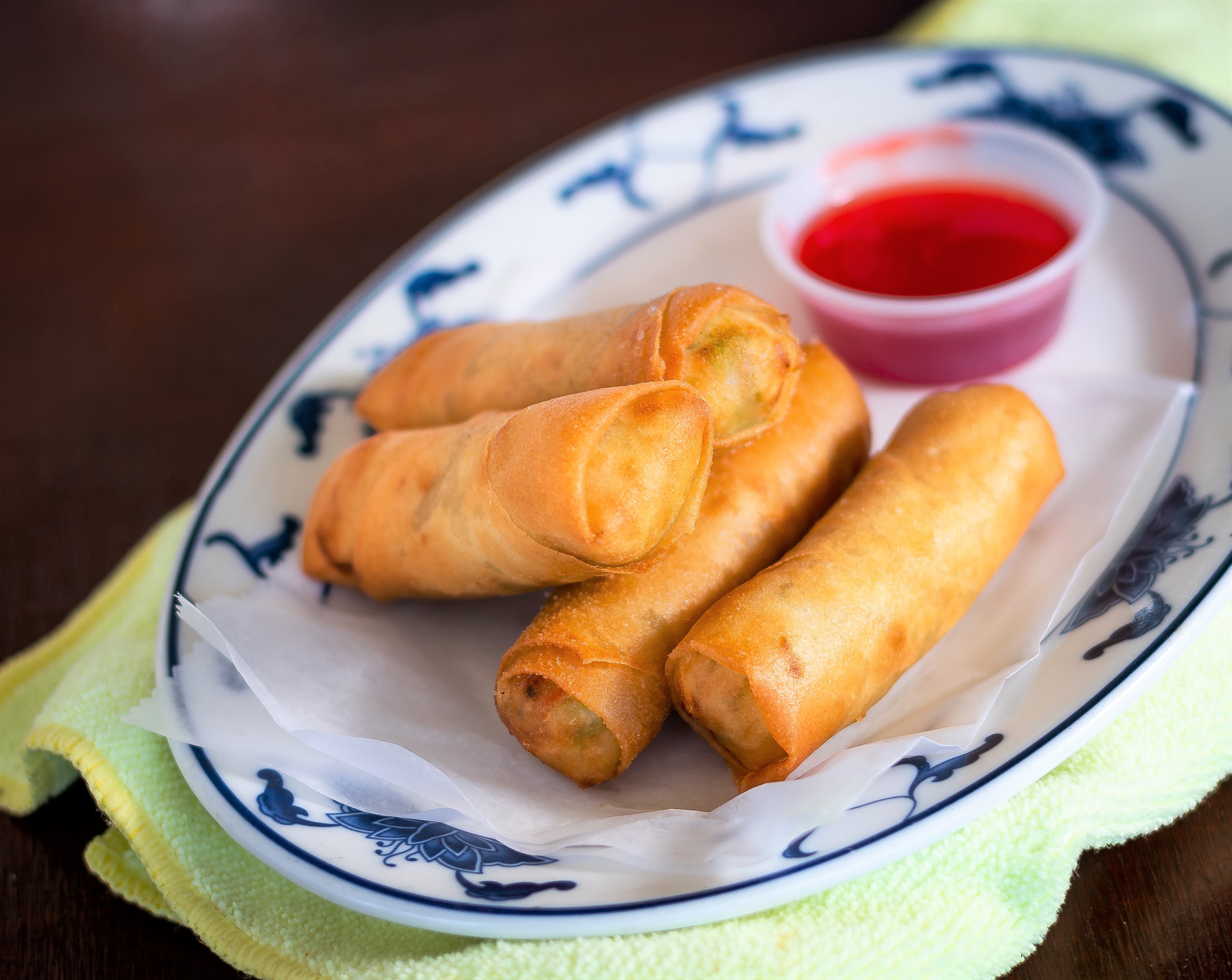 Order 4 Vegetarian Egg Rolls food online from China West Express store, Tustin on bringmethat.com