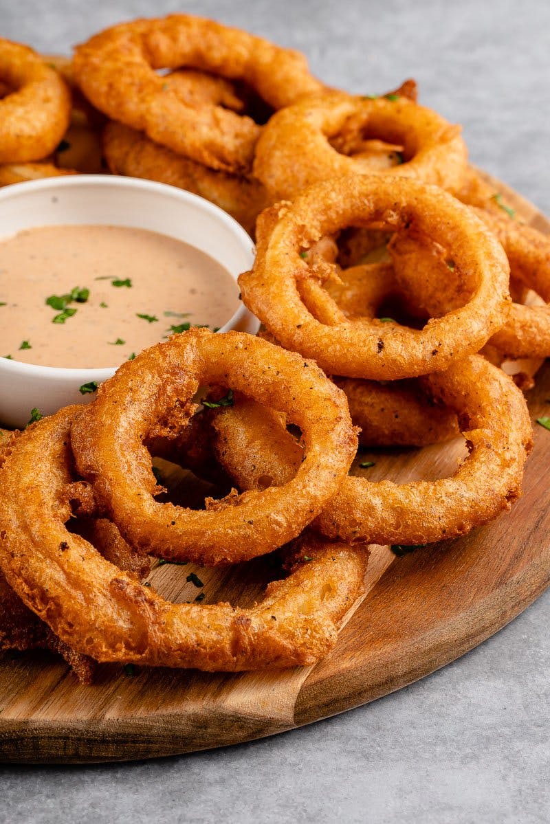 Order Onion Rings - Side food online from Athens Pizza store, Athens on bringmethat.com