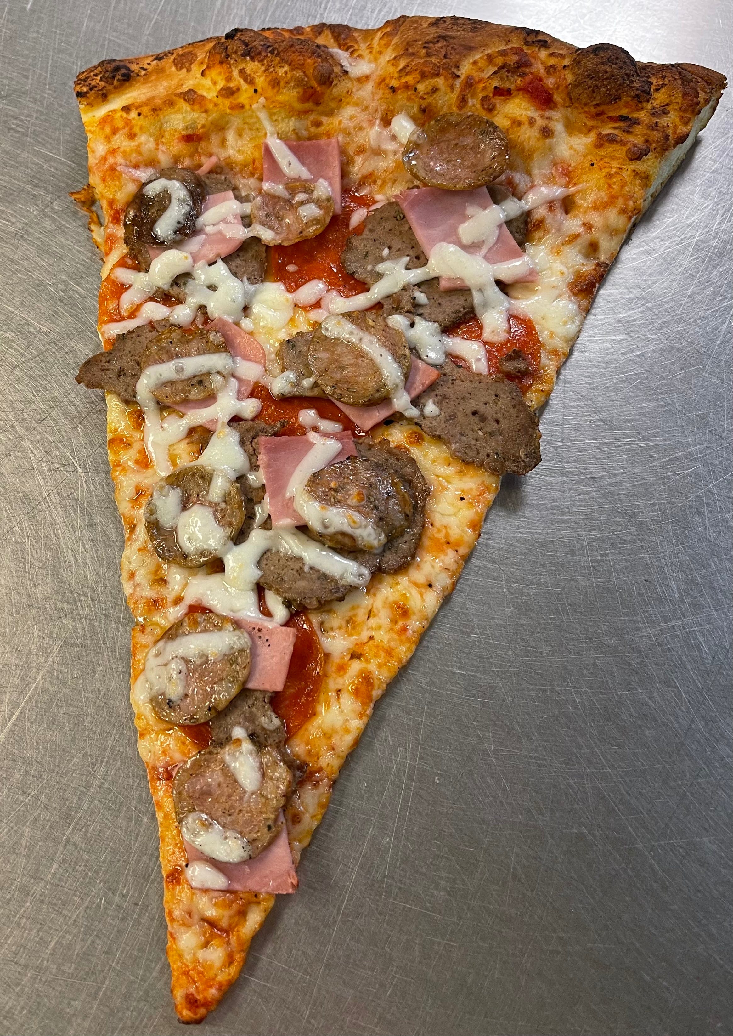 Order Meat Eaters Pizza Slice - Slice food online from Bella Pizza & Pasta store, Mesa on bringmethat.com