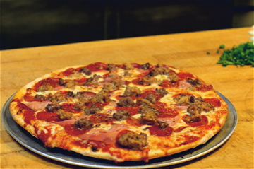 Order Meat Combo New York Thin Crust Pizza food online from Tomaso store, Marion on bringmethat.com