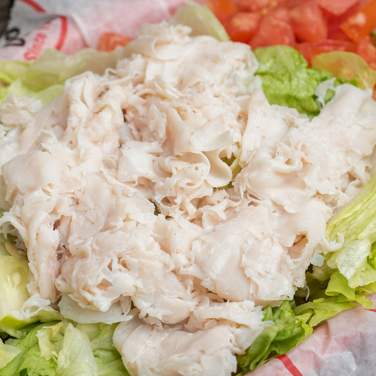 Order *Angel Salad food online from Groucho's Deli store, Statesville on bringmethat.com