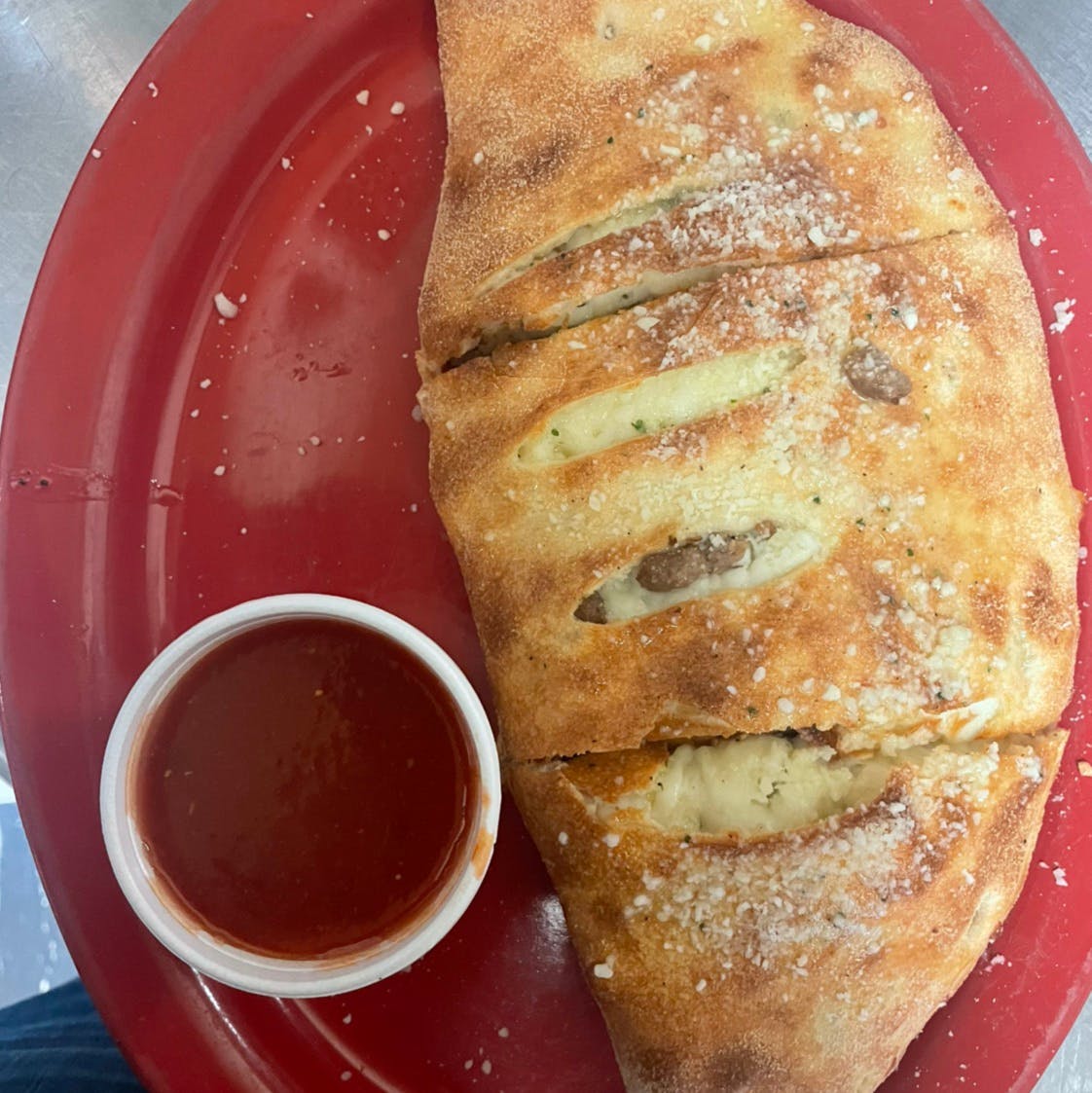 Order Deluxe Calzone - Small food online from Casa Nostra Italian Cuisine store, Greeneville on bringmethat.com