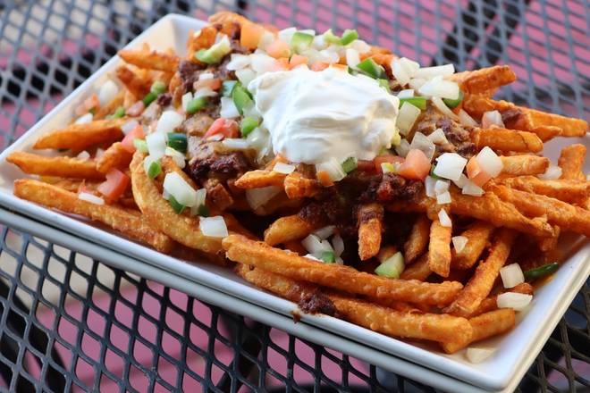 Order Loaded Fries w Beef Chilli Cheese food online from Cowboys & Indians Tex-In Kitchen store, Houston on bringmethat.com