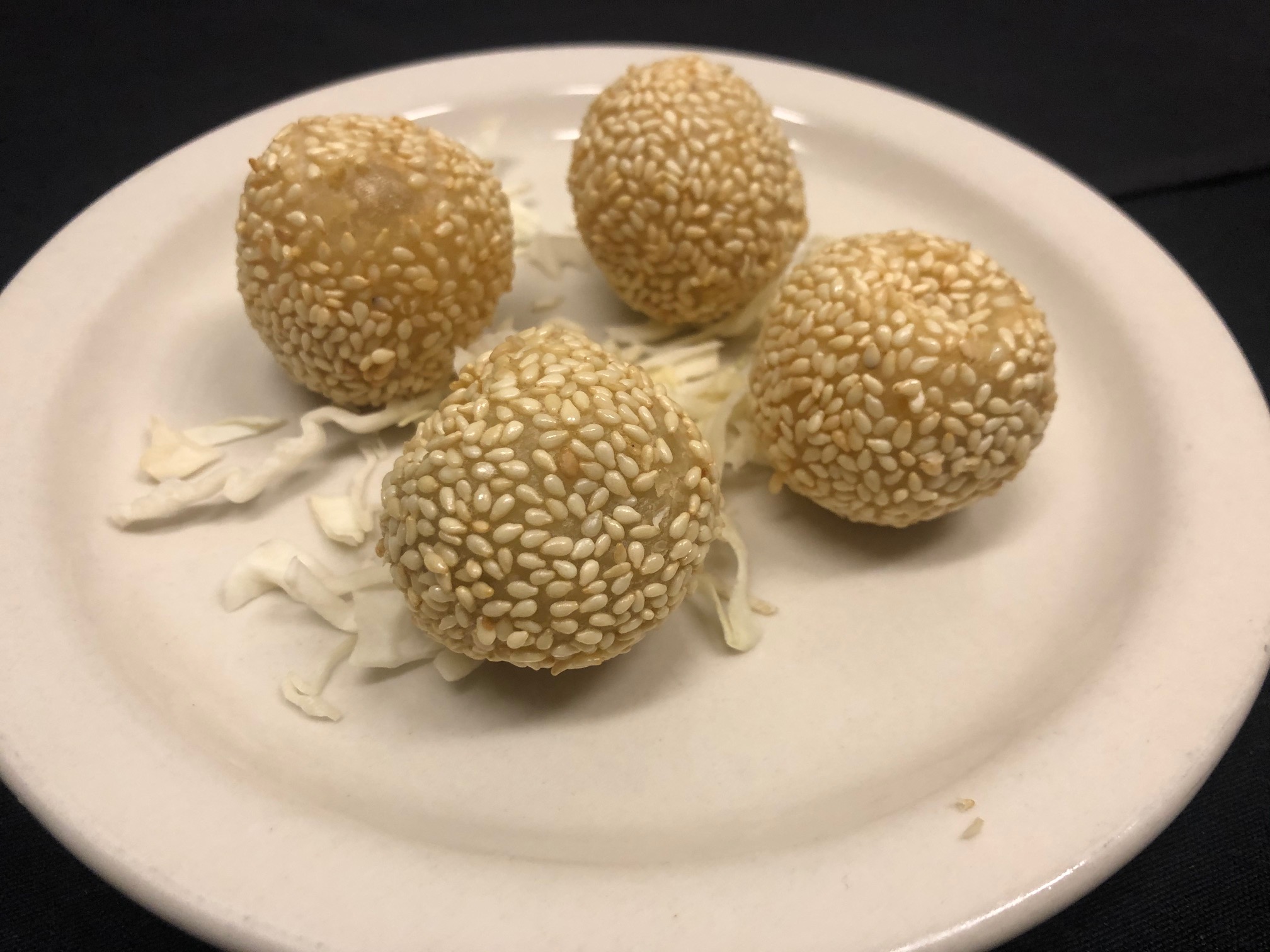 Order Mini Sesame Seed Balls(4) food online from Bo Asian Bistro store, Round Rock on bringmethat.com
