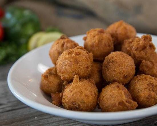 Order Hush Puppies food online from Don's Seafood Hut store, Metairie on bringmethat.com