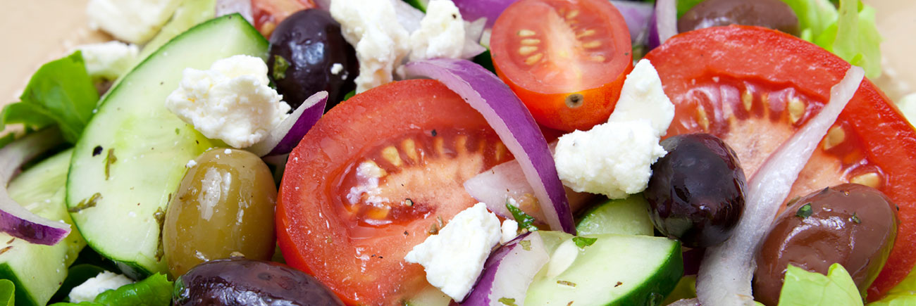 Order Famous Greek Salad food online from Pizzoli's pizza store, Washington on bringmethat.com