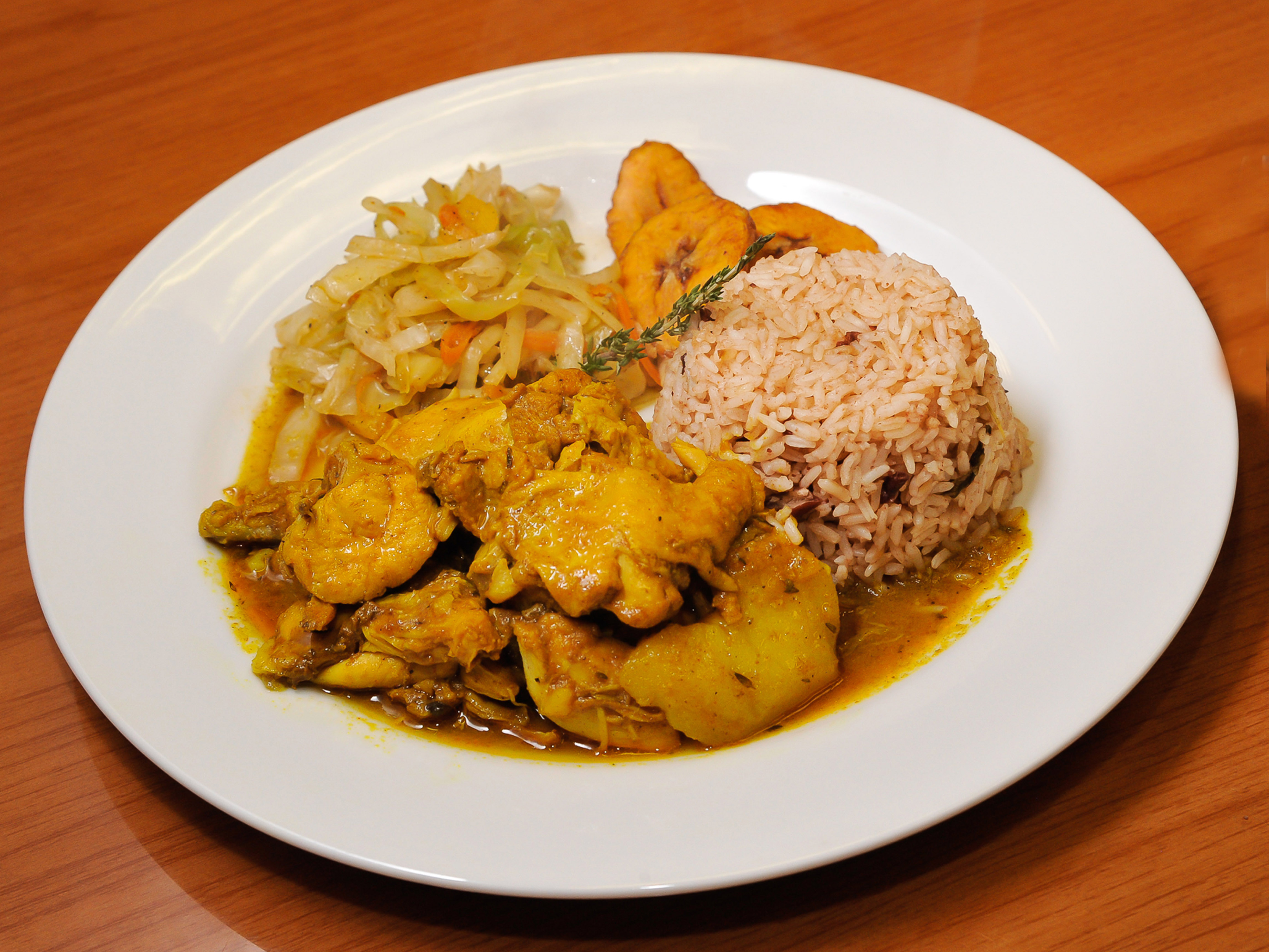 Order Curry Chicken food online from Irie Mon Cafe store, Atlanta on bringmethat.com