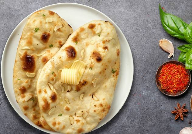 Order Garlic Naan food online from Vegetarian Curry Tradition store, Madison on bringmethat.com