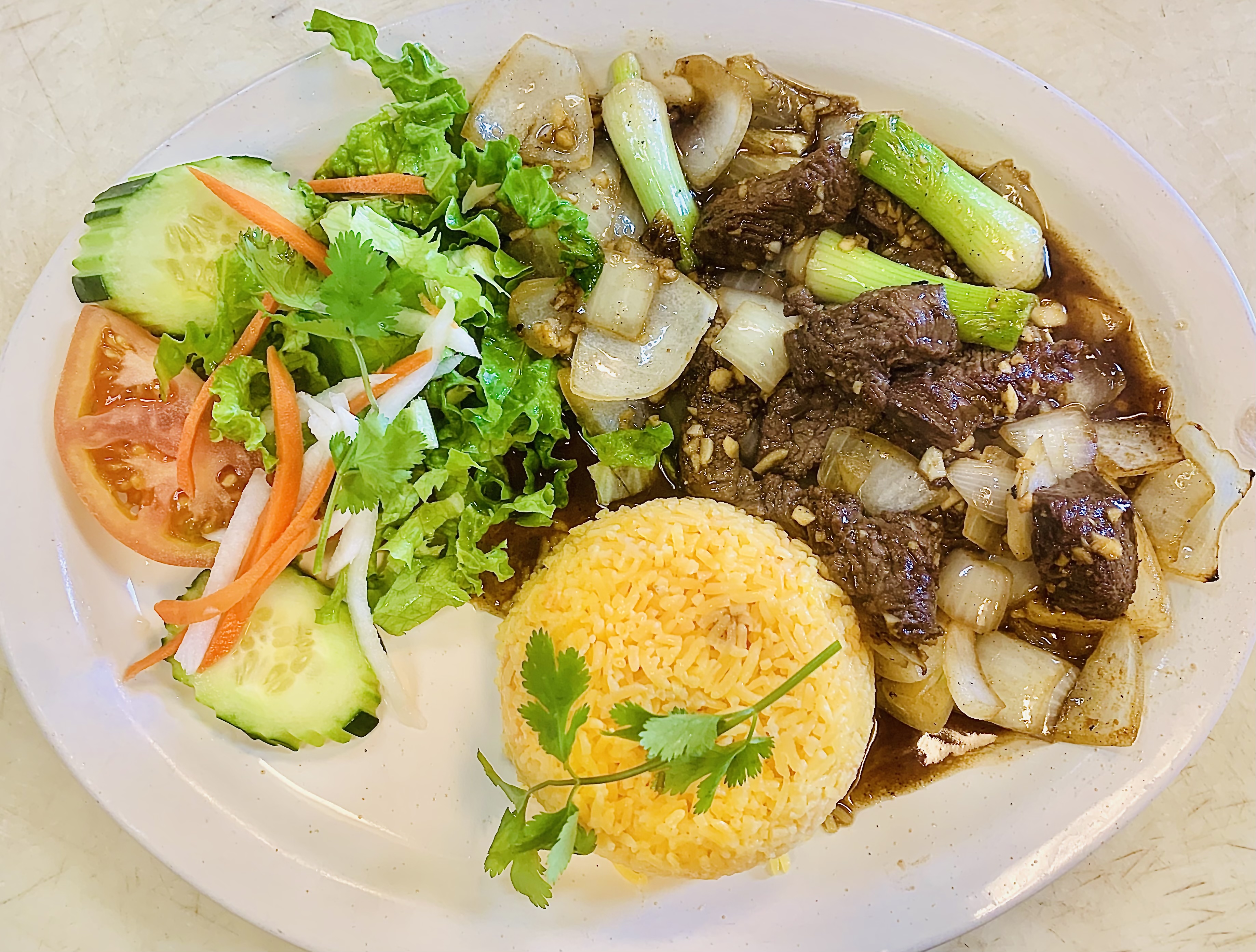 Order Com  Bo Luc Lac food online from Pho Hanoi store, Lake Forest on bringmethat.com