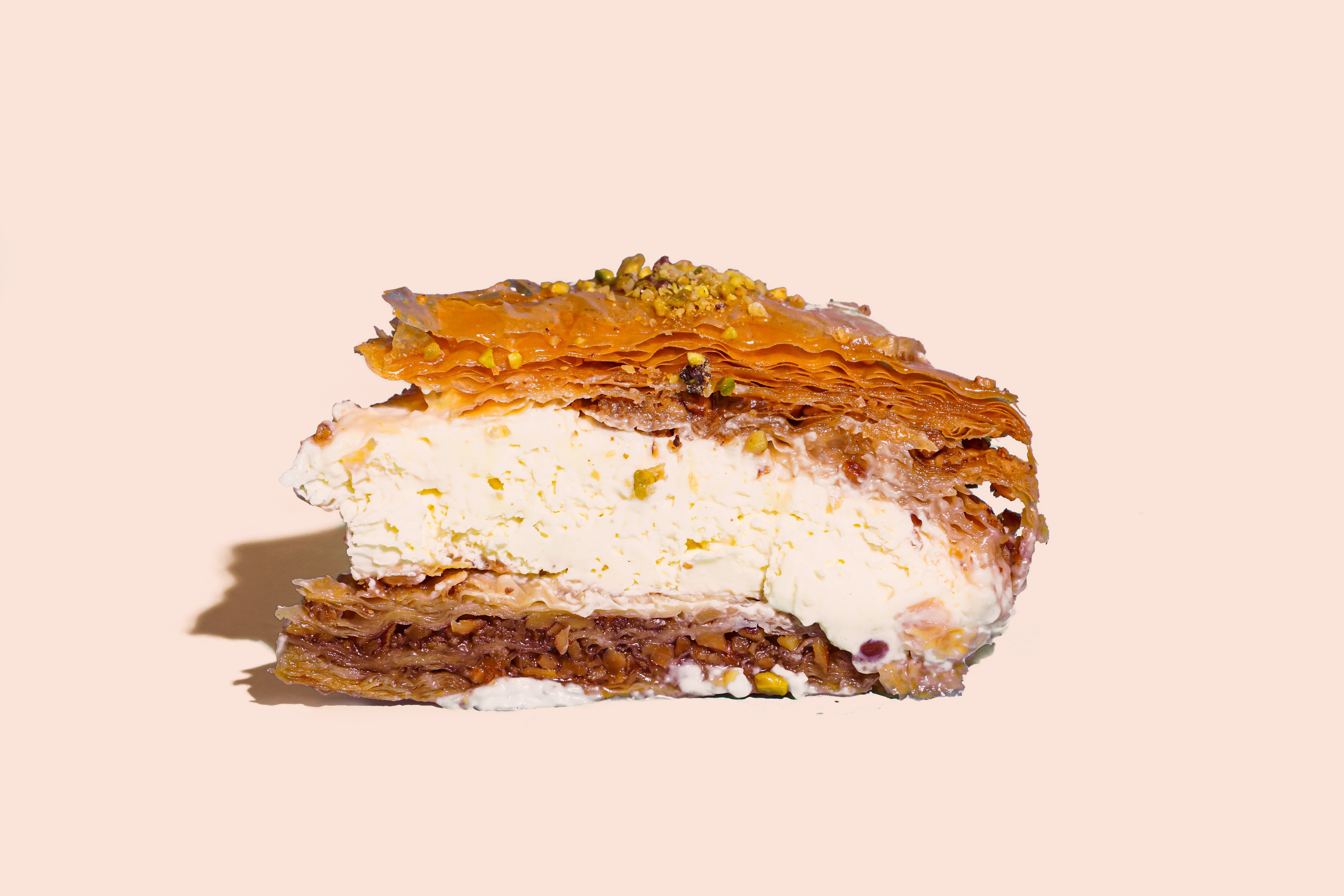 Order Baklava Cheesecake food online from Oasis Cafe store, Flushing on bringmethat.com