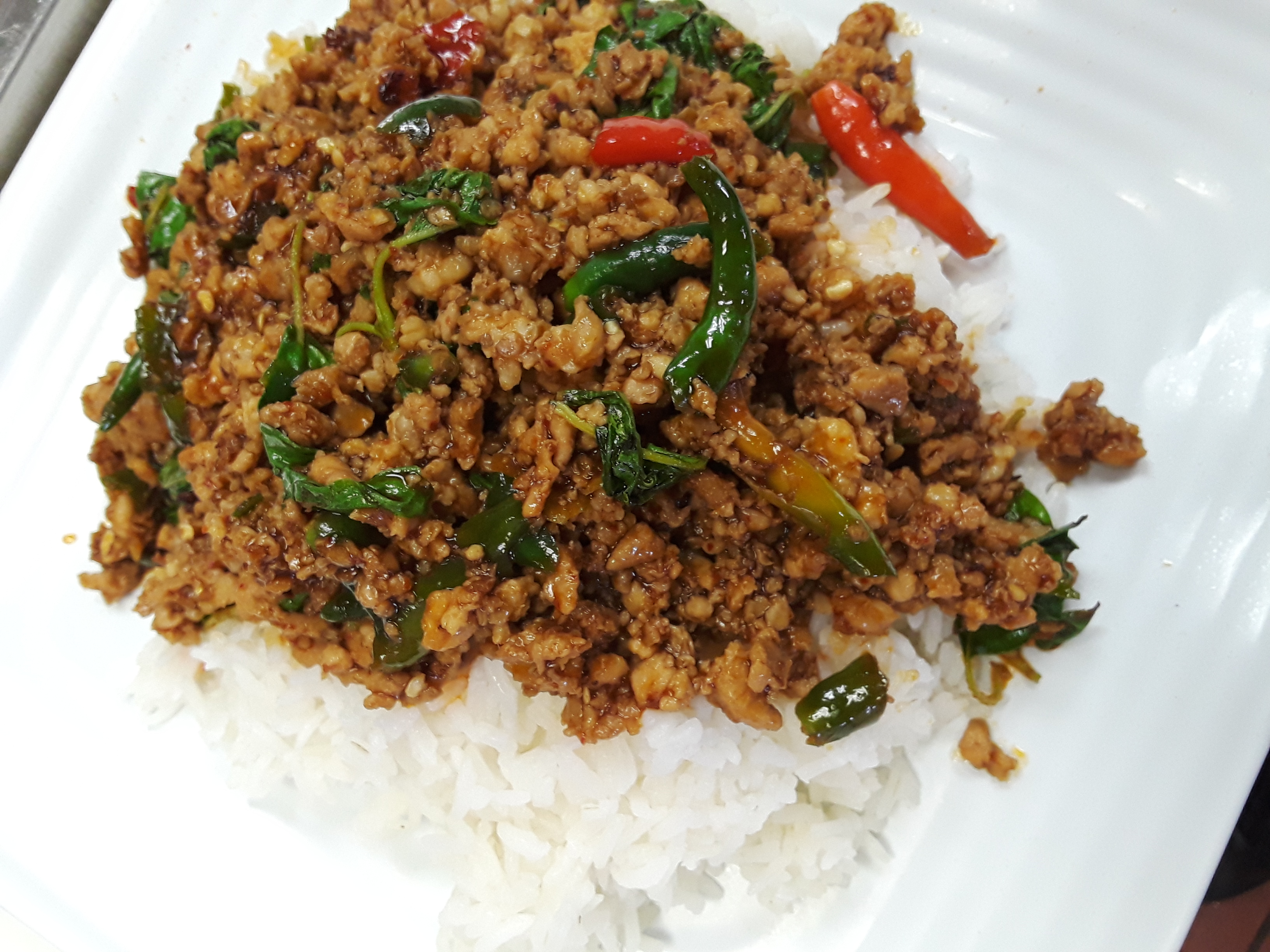 Order Spicy chicken basil With Rice (Ground Chicken) food online from Chili & Lemon Thai Cuisine store, Los Angeles on bringmethat.com