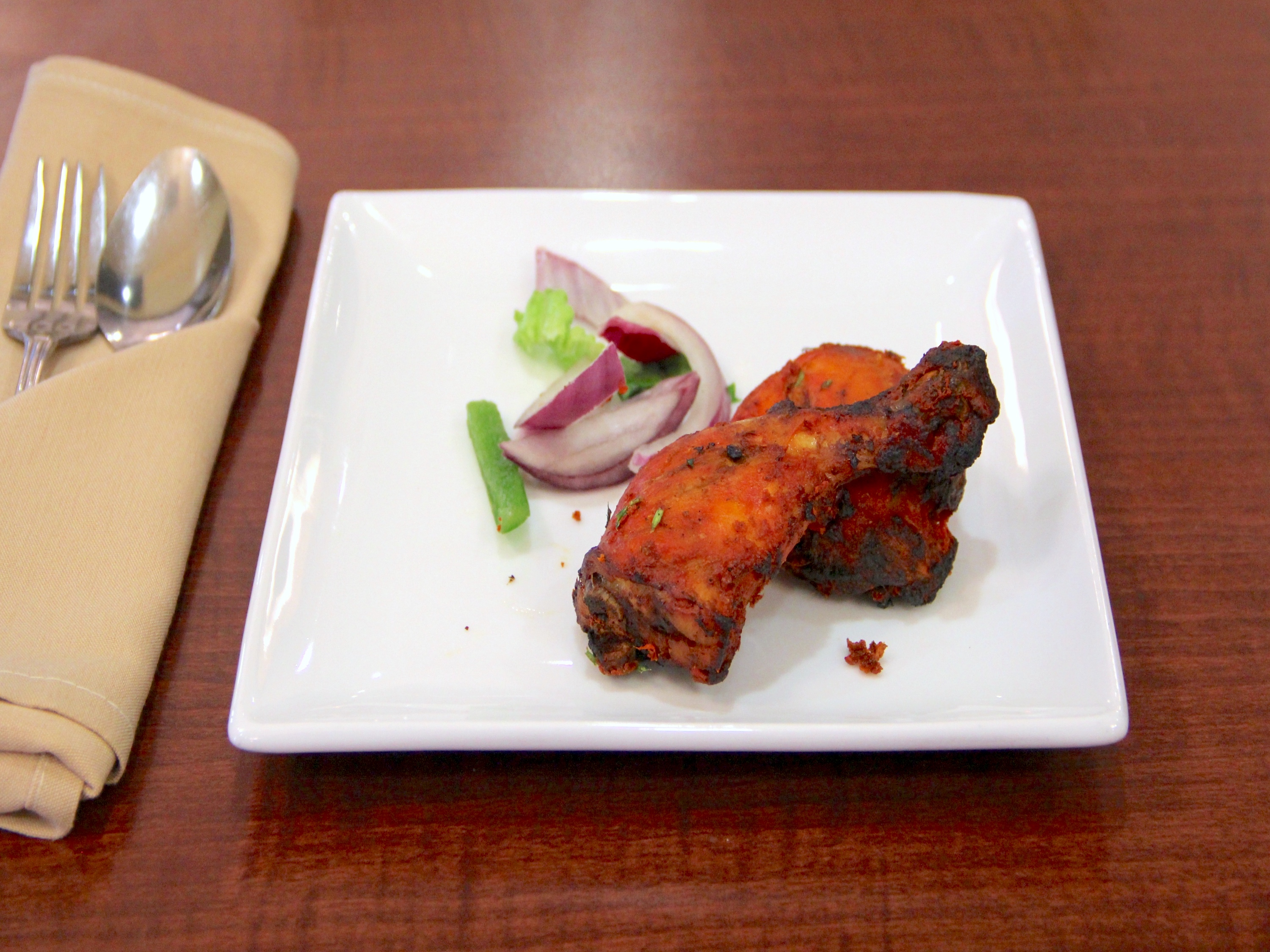 Order Tandoori Chicken food online from Bombay Blues Indian Restaurant store, Chino Hills on bringmethat.com