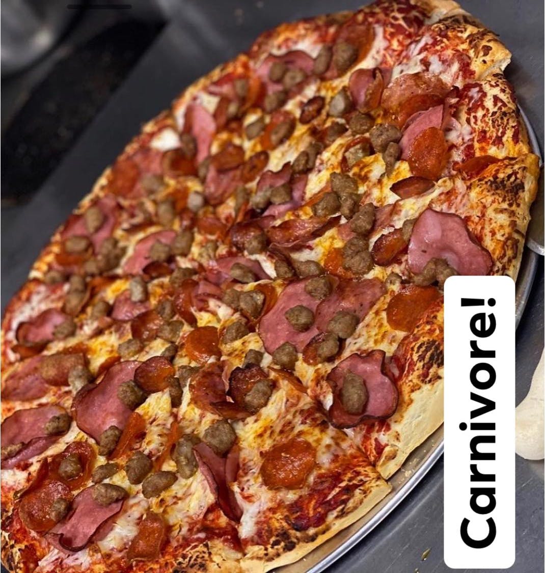 Order Carnivore Pizza - Personal food online from Rico's Pizza store, Los Banos on bringmethat.com