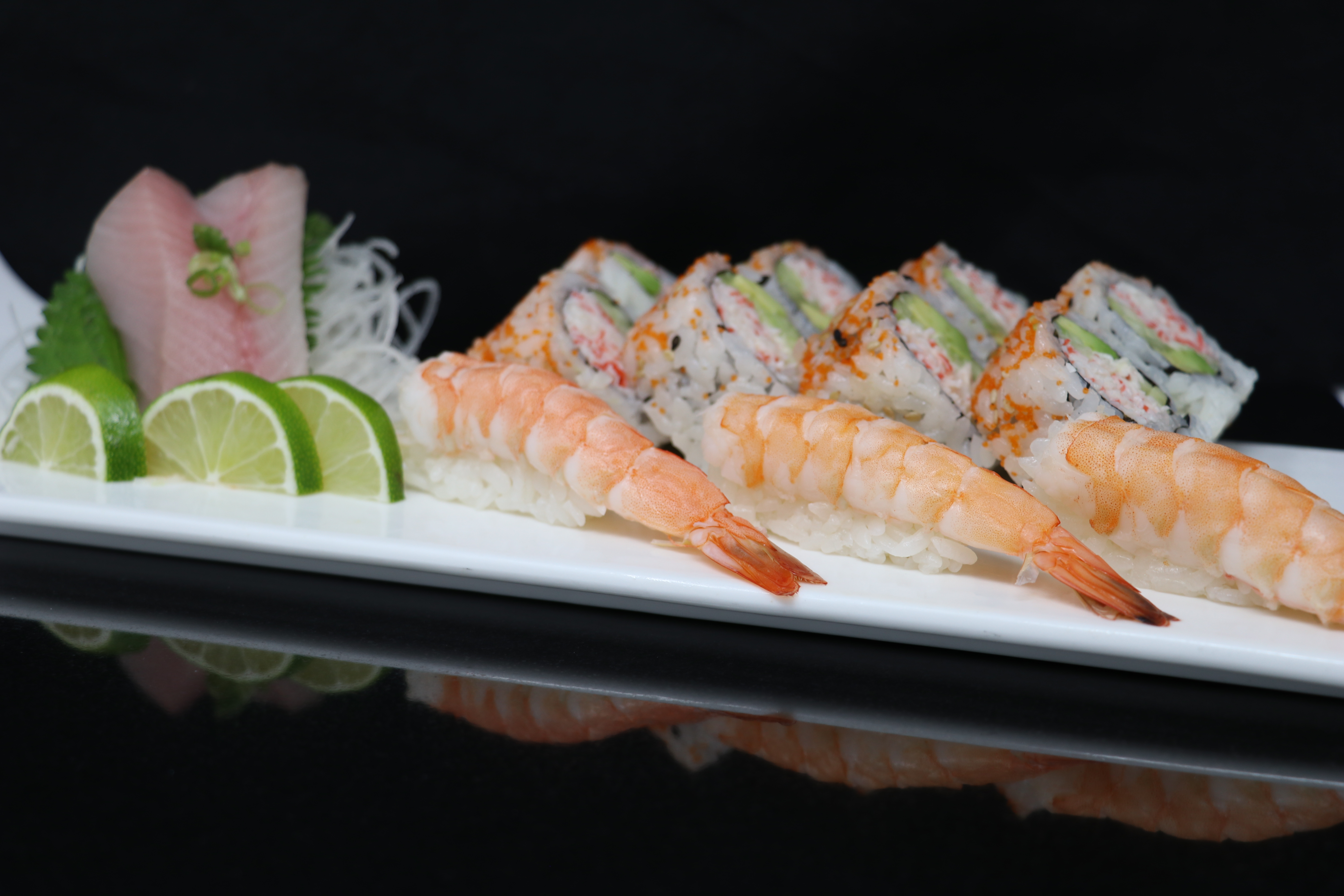 Order 6. Two Pieces Yellowtail Sashimi, 3 Pieces Shrimp Sushi and 8 Pieces Cali Rolls Lunch food online from Sushi Sakura Express store, Houston on bringmethat.com