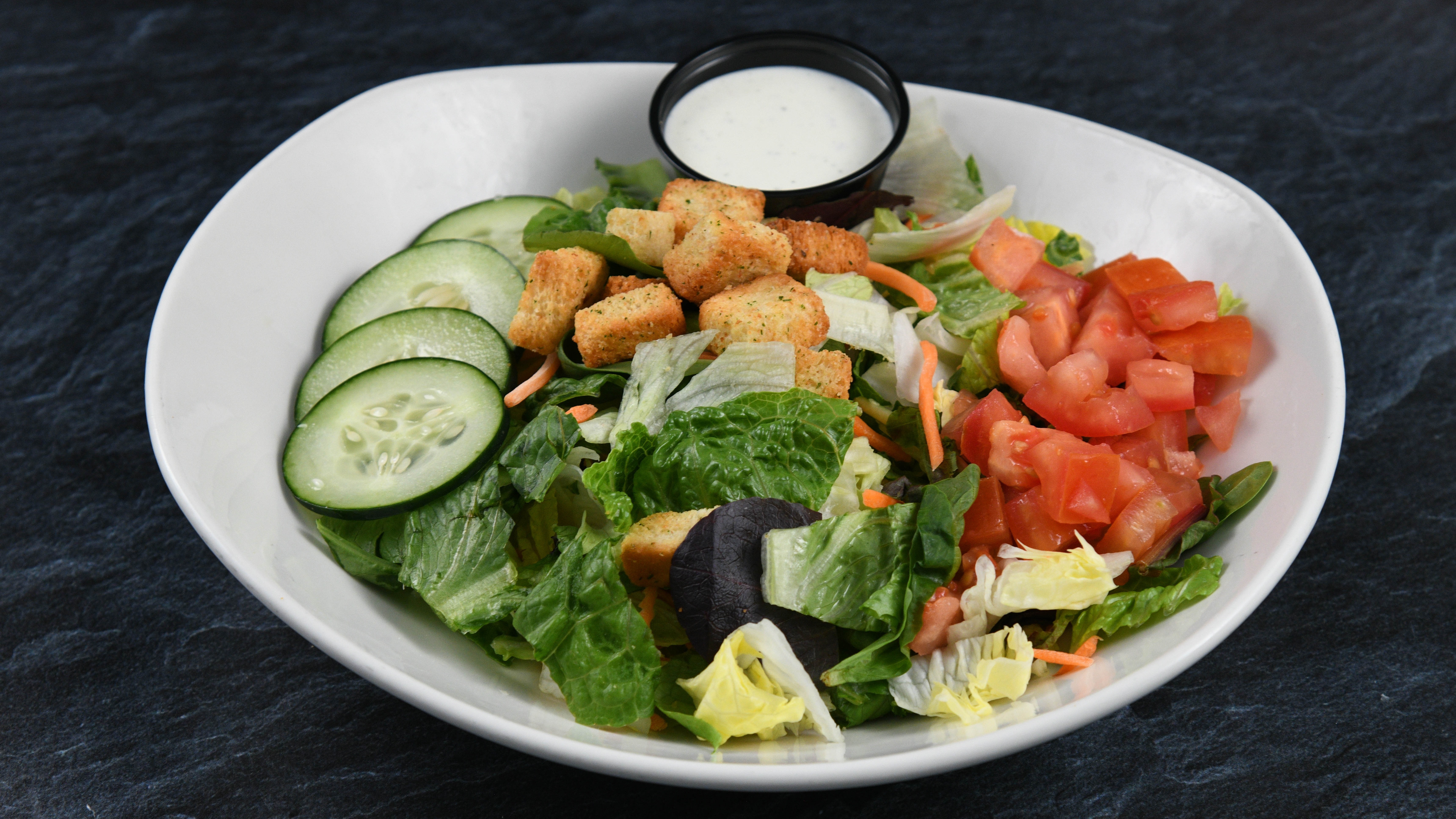 Order Paradise House Salad food online from Rainforest Cafe store, Atlantic City on bringmethat.com
