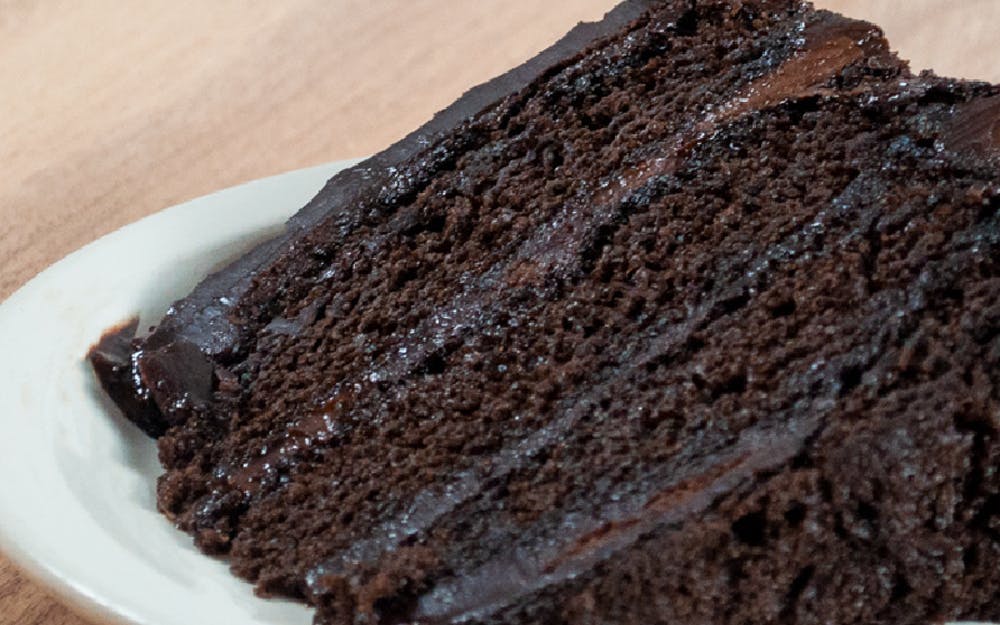 Order Double Chocolate Cake - Dessert food online from Seasons Pizza store, Wilmington on bringmethat.com