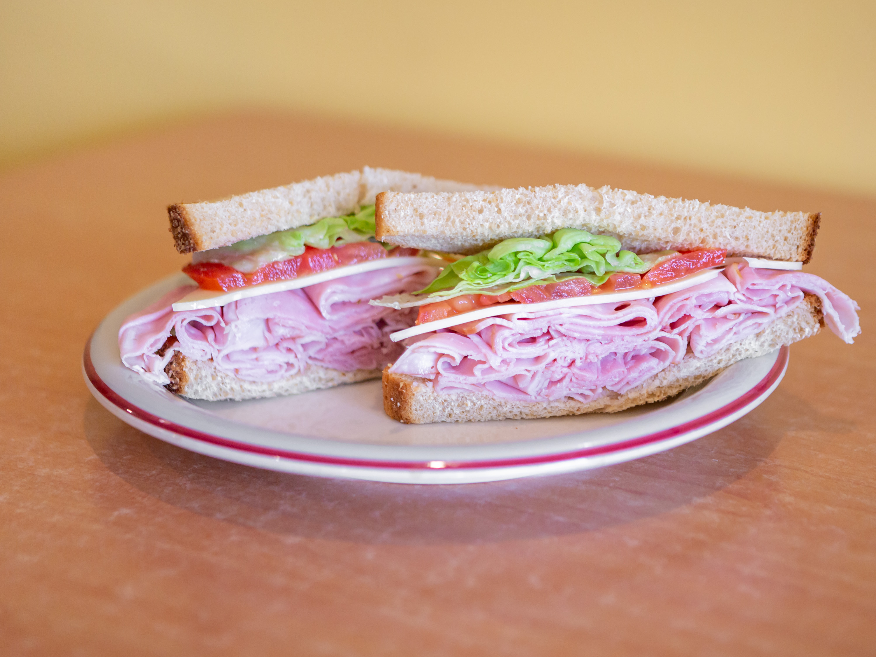 Order Ham and Swiss Sandwich food online from The Peaberry Bean & Beats store, Whitmore Lake on bringmethat.com