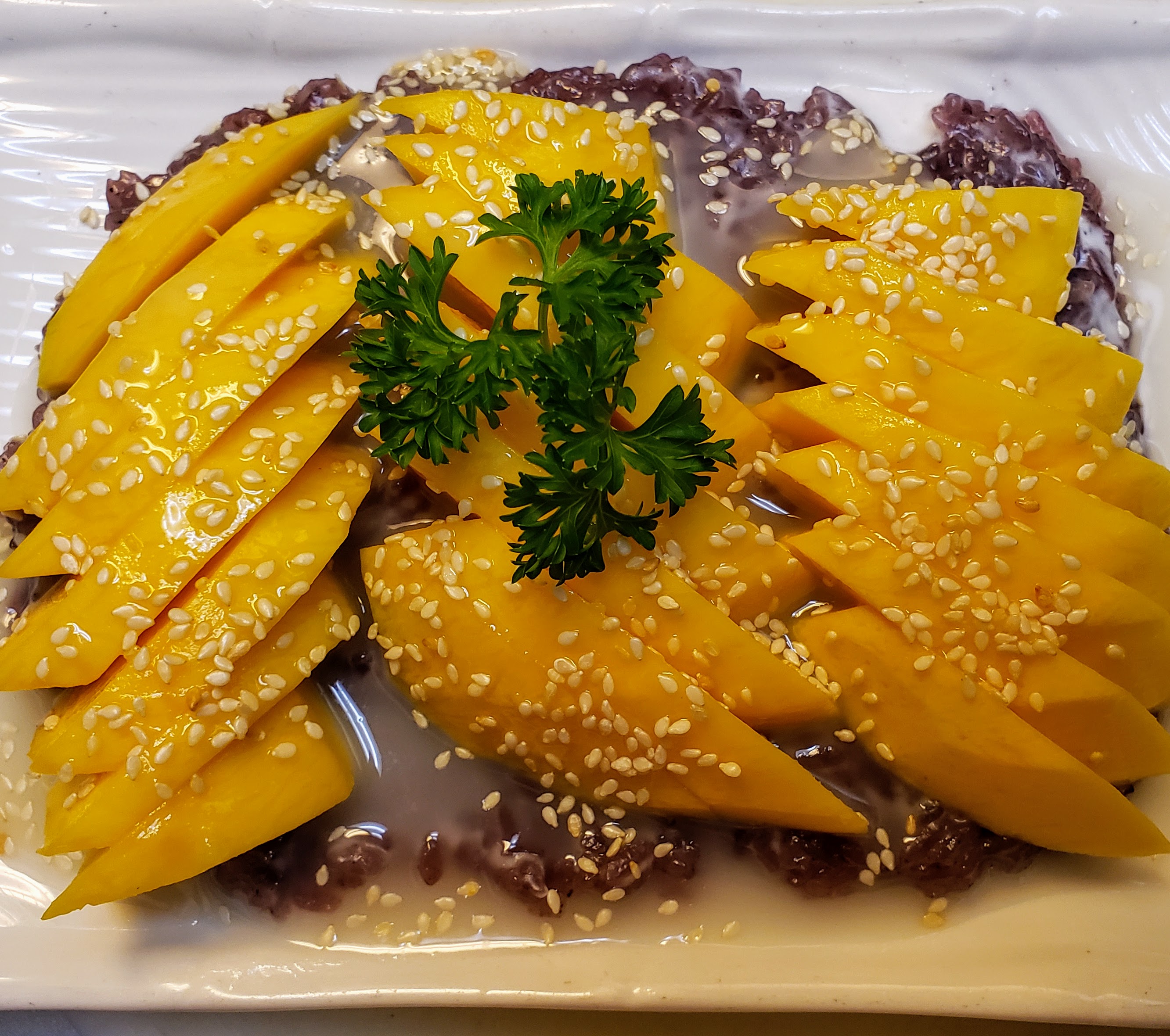 Order 62. Fresh Mango with Sticky Purple Rice food online from Thai Nary BBQ store, Azusa on bringmethat.com