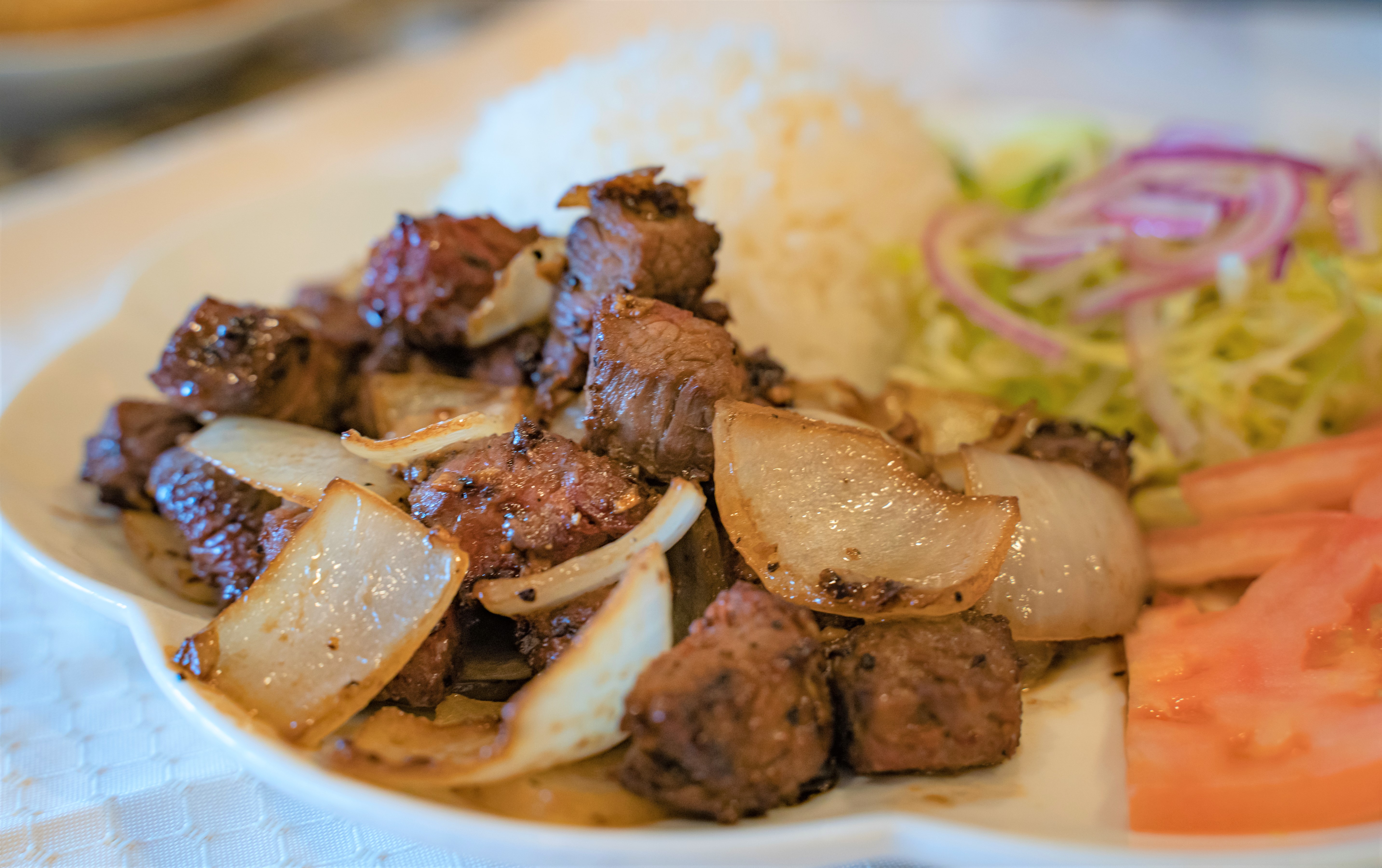 Order 41. Sauteed Beef Cubes with Onions and Garlics food online from Saigonese store, Hartsdale on bringmethat.com