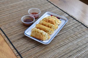 Order Fried Dumplings (8pcs) 煎饺寧 food online from Fine China store, Lansing on bringmethat.com
