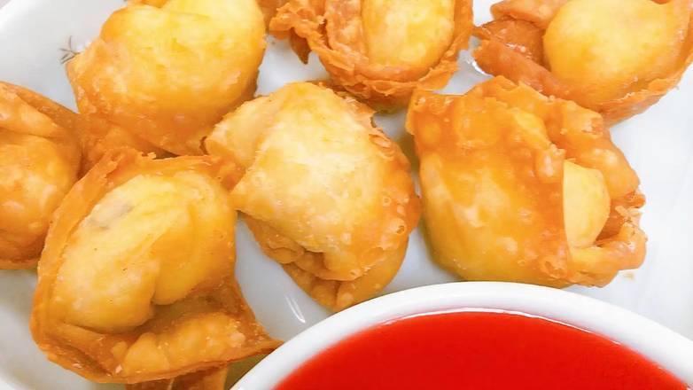 Order Crab Cheese Rangoon (5 pcs) (蟹⻆) food online from Red Dragon store, Concord on bringmethat.com