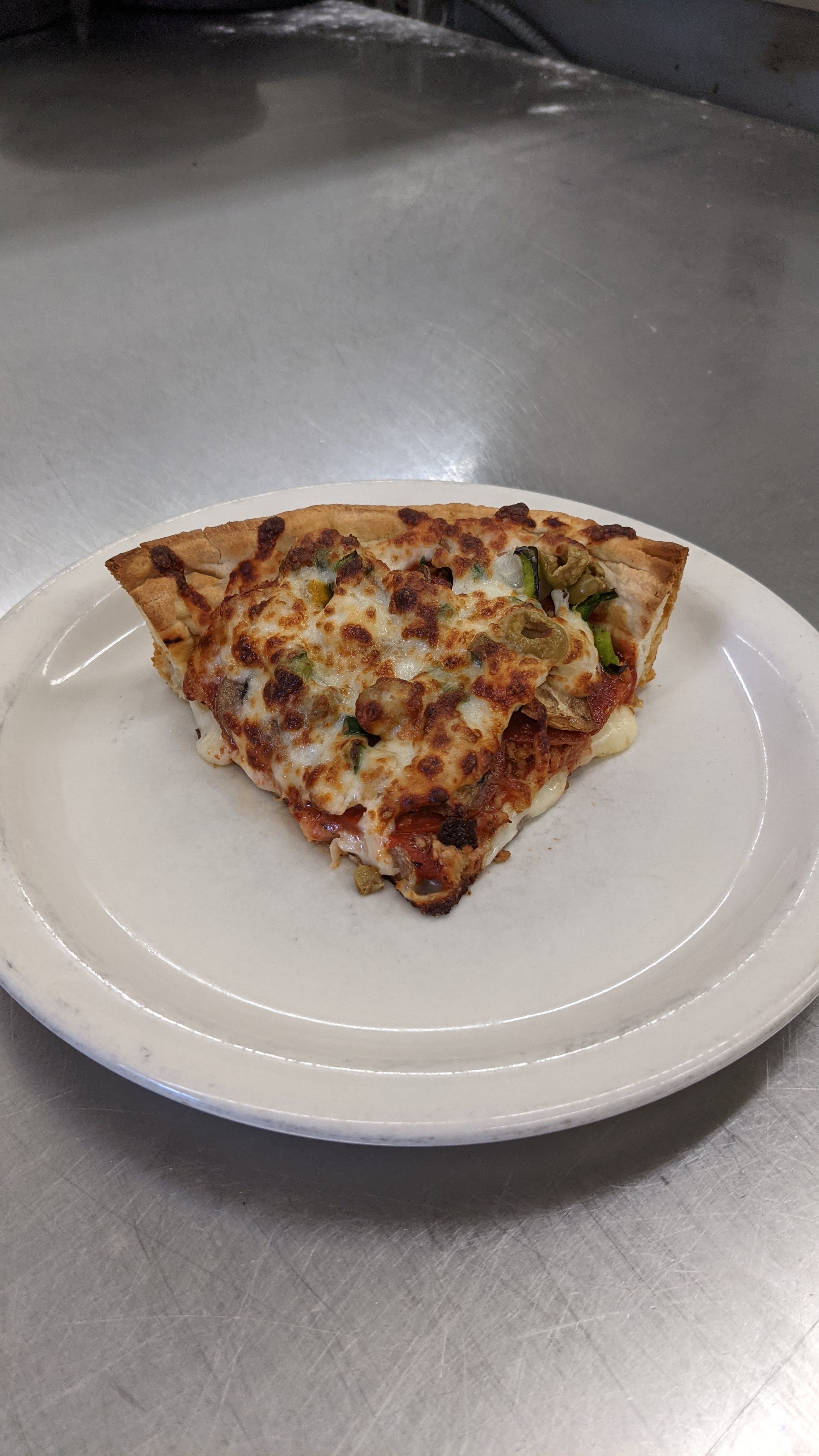 Order Deluxe Pizza Slice - Slice food online from Oley Pizza store, Fort Wayne on bringmethat.com
