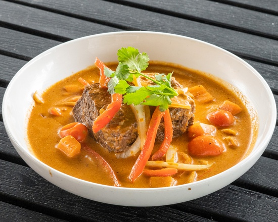 Order Massaman Curry Braised Beef Short Rib food online from PakPao Thai  store, Dallas on bringmethat.com