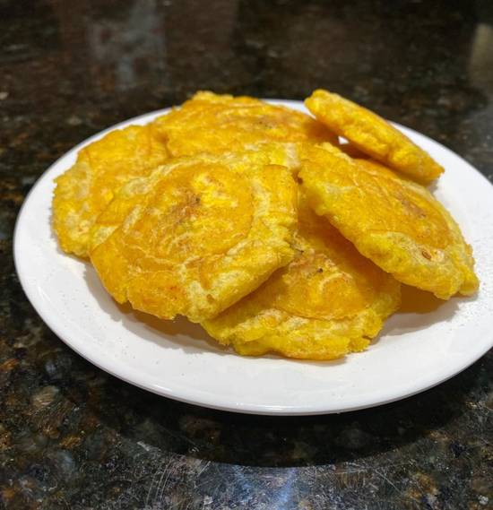 Order Tostones / Fried Plantains food online from Los Amigos Latin Cuisine store, Binghamton on bringmethat.com
