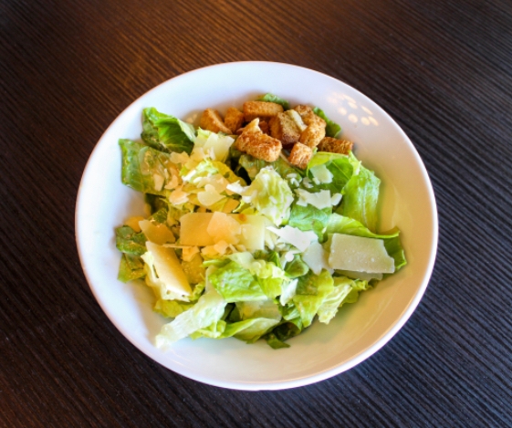 Order Starter Caesar Salad food online from Junior's Bar and Grill store, Albany on bringmethat.com