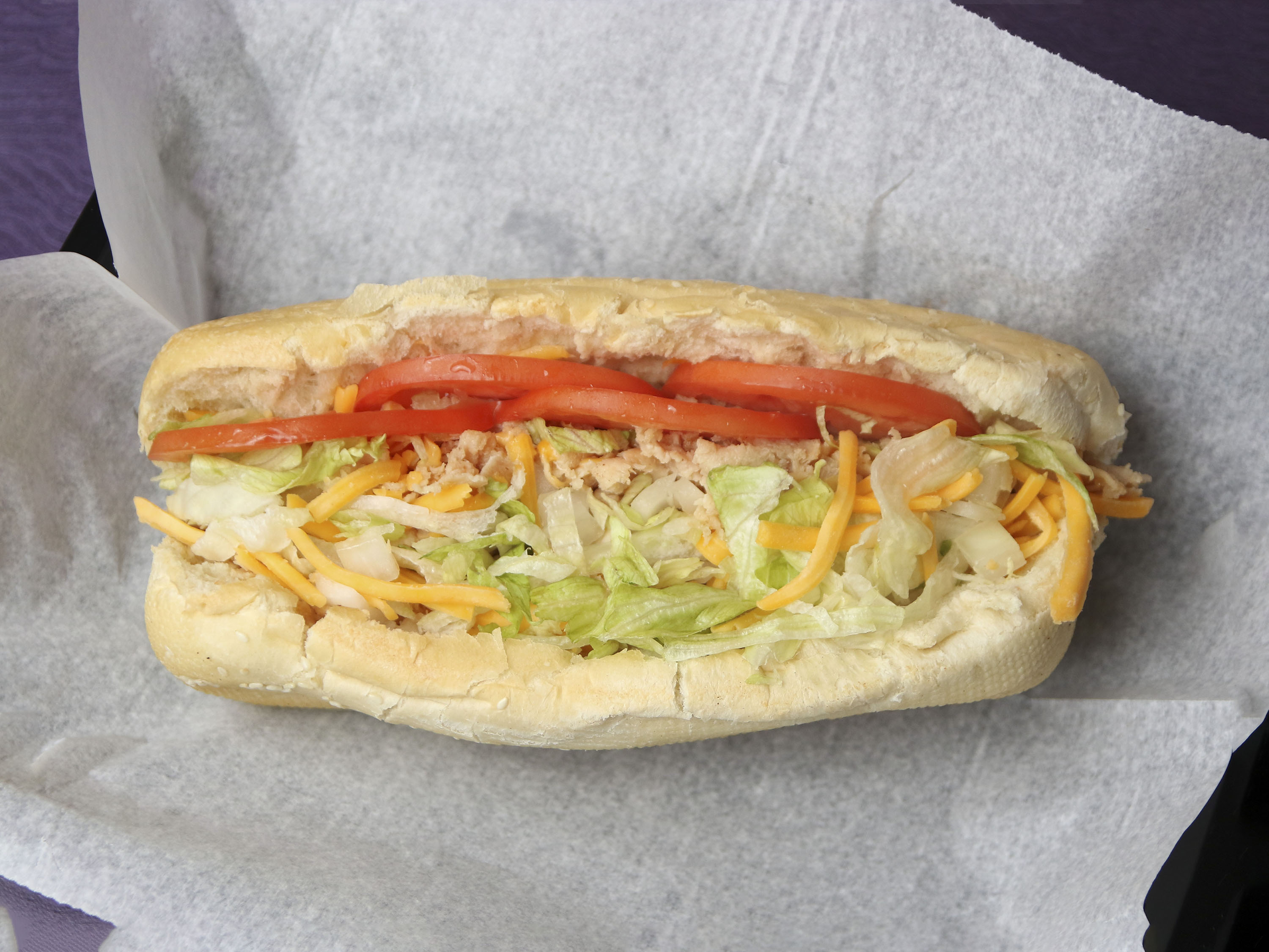 Order Chicken and Cheddar Sub food online from Tubby's Grilled Submarines store, Sterling Heights on bringmethat.com