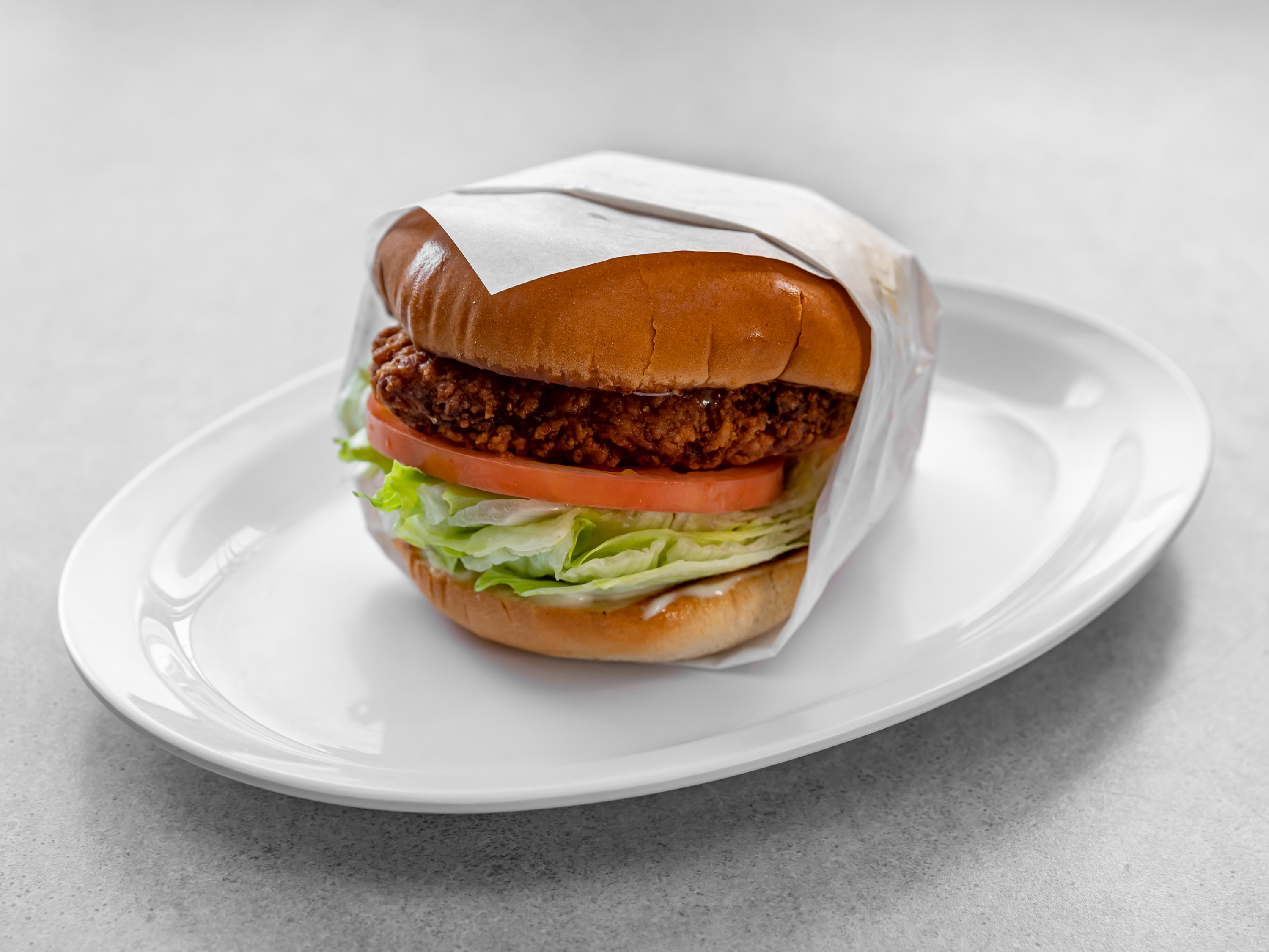 Order *New* Spicy Crispy Chicken Sandwich food online from Omega Burgers Lakewood store, Lakewood on bringmethat.com