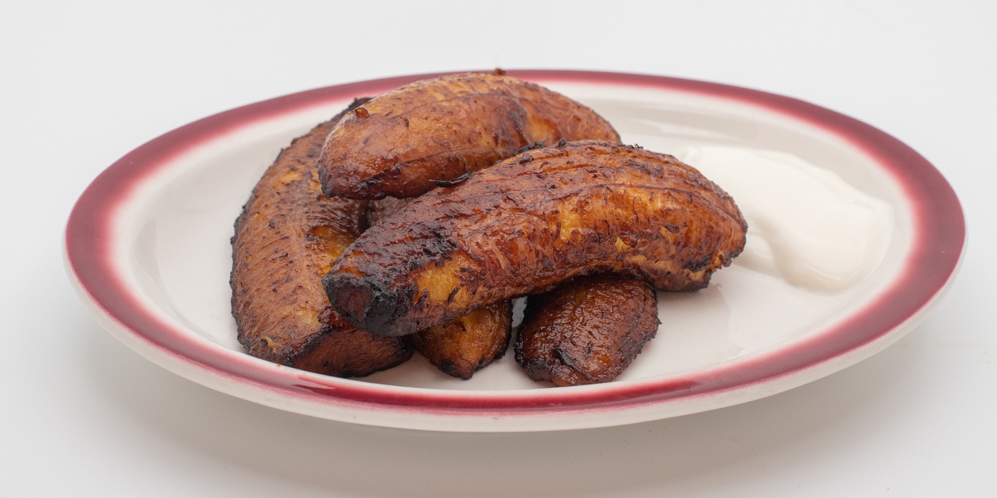Order Large Fried Plantain food online from Amelia's Taqueria store, Allston on bringmethat.com